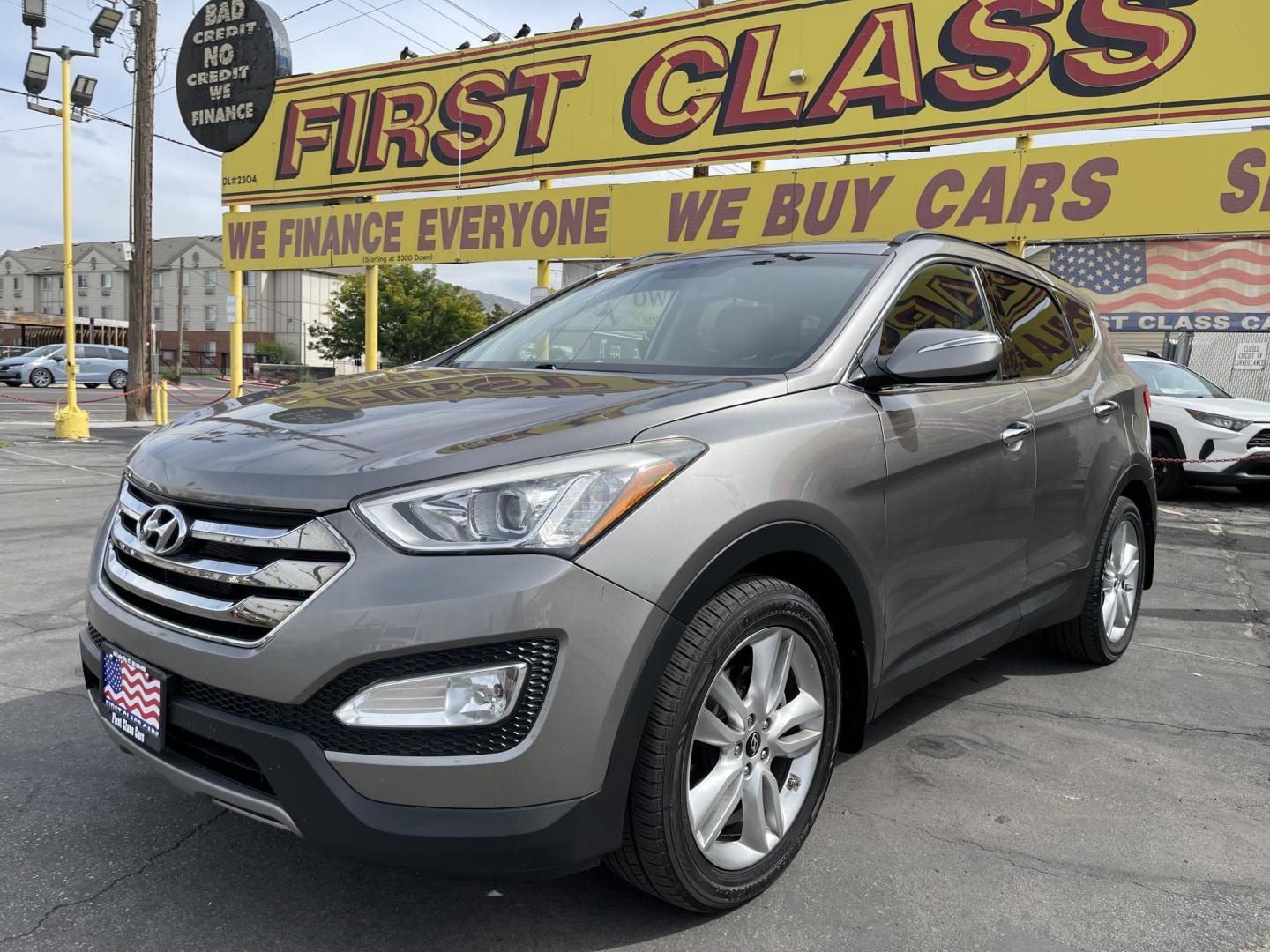 2013 Bamboo Pearl /Black Hyundai Santa Fe Sport 2.0 AWD (5XYZUDLA9DG) with an 2.0L L4 DOHC 16V engine, 6-Speed Automatic transmission, located at 801 South State Street, Salt Lake City, UT, 84111, (801) 328-0098, 40.751953, -111.888206 - Clean title no accidents!!! Super clean with very low miles only 67k miles very clean hard to find! This is perfect for the snow with all wheel drive perfect all around year SUV! Immaculate condition inside and out Carfax shows all regular service was done and cared for. The 2013 Hyundai Santa Fe 2. - Photo#1