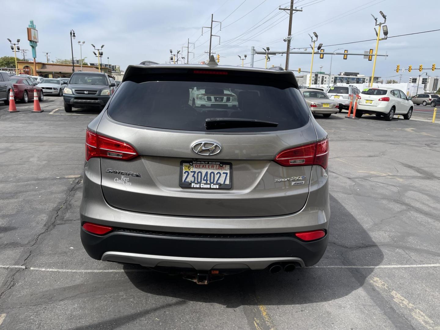 2013 Bamboo Pearl /Black Hyundai Santa Fe Sport 2.0 AWD (5XYZUDLA9DG) with an 2.0L L4 DOHC 16V engine, 6-Speed Automatic transmission, located at 801 South State Street, Salt Lake City, UT, 84111, (801) 328-0098, 40.751953, -111.888206 - Clean title no accidents!!! Super clean with very low miles only 67k miles very clean hard to find! This is perfect for the snow with all wheel drive perfect all around year SUV! Immaculate condition inside and out Carfax shows all regular service was done and cared for. The 2013 Hyundai Santa Fe 2. - Photo#7