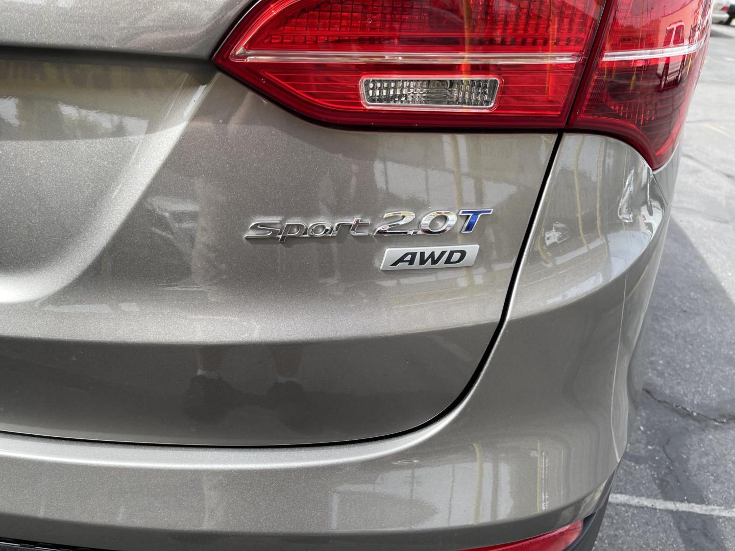 2013 Bamboo Pearl /Black Hyundai Santa Fe Sport 2.0 AWD (5XYZUDLA9DG) with an 2.0L L4 DOHC 16V engine, 6-Speed Automatic transmission, located at 801 South State Street, Salt Lake City, UT, 84111, (801) 328-0098, 40.751953, -111.888206 - Clean title no accidents!!! Super clean with very low miles only 67k miles very clean hard to find! This is perfect for the snow with all wheel drive perfect all around year SUV! Immaculate condition inside and out Carfax shows all regular service was done and cared for. The 2013 Hyundai Santa Fe 2. - Photo#31
