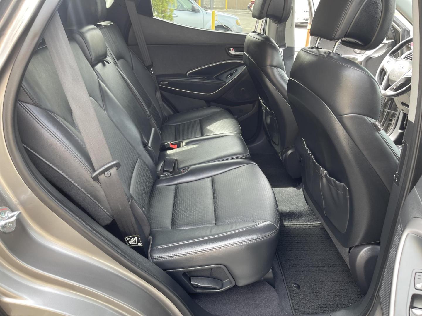 2013 Bamboo Pearl /Black Hyundai Santa Fe Sport 2.0 AWD (5XYZUDLA9DG) with an 2.0L L4 DOHC 16V engine, 6-Speed Automatic transmission, located at 801 South State Street, Salt Lake City, UT, 84111, (801) 328-0098, 40.751953, -111.888206 - Clean title no accidents!!! Super clean with very low miles only 67k miles very clean hard to find! This is perfect for the snow with all wheel drive perfect all around year SUV! Immaculate condition inside and out Carfax shows all regular service was done and cared for. The 2013 Hyundai Santa Fe 2. - Photo#37