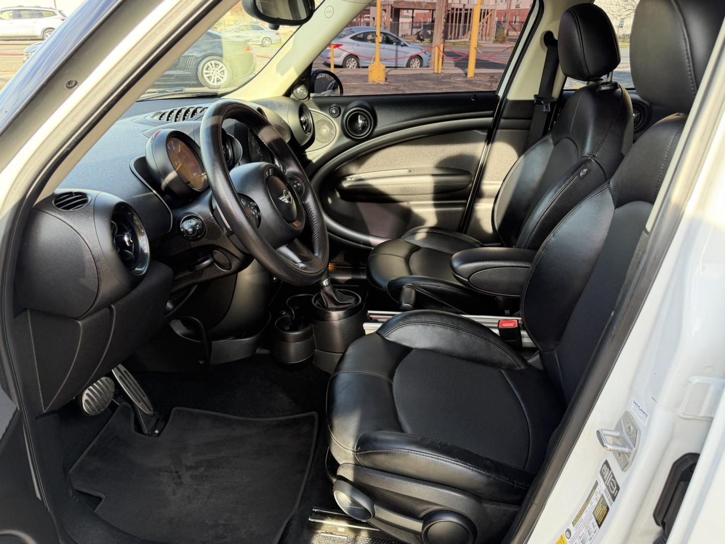 2015 Super White /Black Mini Countryman S (WMWZC3C57FW) with an 1.6L L4 DOHC 16V TURBO engine, Automatic transmission, located at 801 South State Street, Salt Lake City, UT, 84111, (801) 328-0098, 40.751953, -111.888206 - Clean title! Immaculate condition! Hard to find in this great condition as this one. Fully loaded nice car great on gas! Features: Countryman S package, Alloy wheels, leather seats, heated seats, automatic, power windows, power locks, power mirrors, low miles, gas saver, great fuel economy, newer - Photo#13