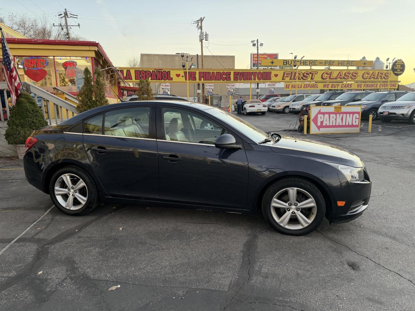 2014 Bluestone Metallic /Tan Chevrolet Cruze 2LT Auto (1G1PE5SB6E7) with an 1.4L L4 DOHC 16V TURBO engine, 6-Speed Automatic transmission, located at 801 South State Street, Salt Lake City, UT, 84111, (801) 328-0098, 40.751953, -111.888206 - 1 Owner car! Clean Title! Hard to find well kept in as great of condition as this one! Has been maintained and taken care of according to the Carfax report it shows all service records that includes regular oil changes and maintenance. No accidents according to Carfax there has never been any accide - Photo#4