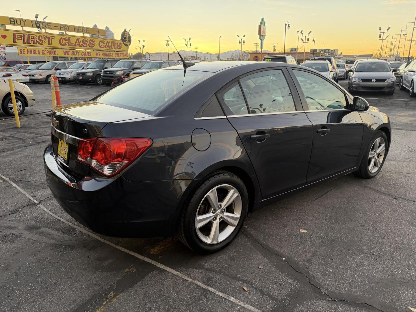 2014 Bluestone Metallic /Tan Chevrolet Cruze 2LT Auto (1G1PE5SB6E7) with an 1.4L L4 DOHC 16V TURBO engine, 6-Speed Automatic transmission, located at 801 South State Street, Salt Lake City, UT, 84111, (801) 328-0098, 40.751953, -111.888206 - 1 Owner car! Clean Title! Hard to find well kept in as great of condition as this one! Has been maintained and taken care of according to the Carfax report it shows all service records that includes regular oil changes and maintenance. No accidents according to Carfax there has never been any accide - Photo#5