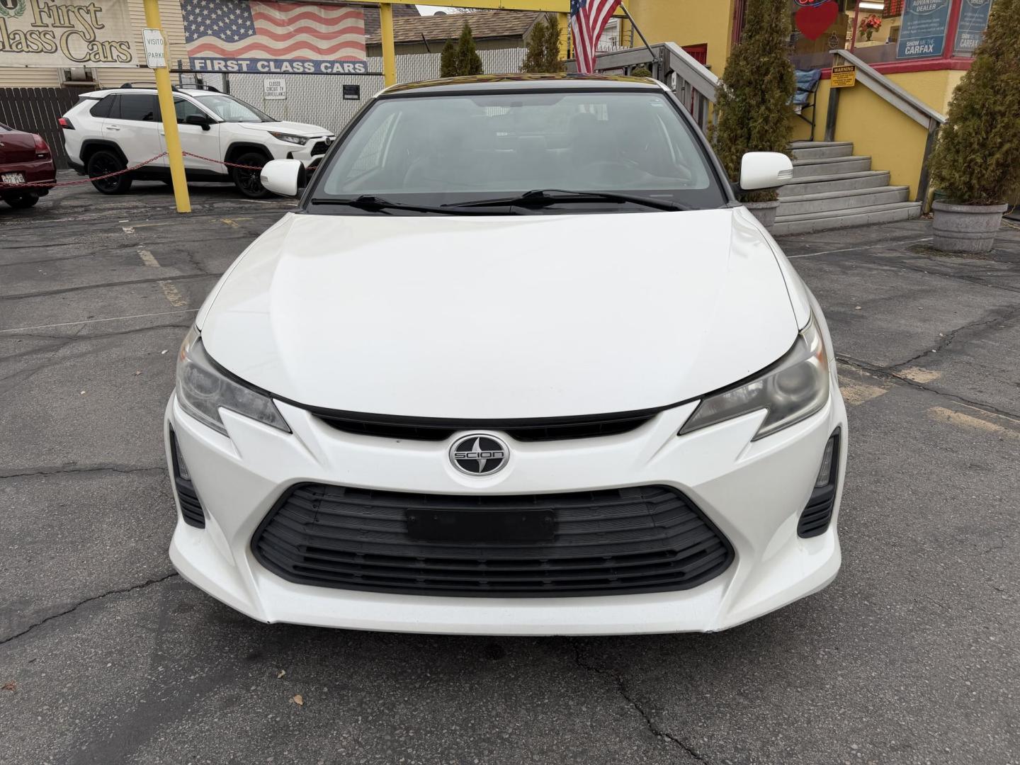 2016 Super White /Black Scion tC Sports Coupe 6-Spd AT (JTKJF5C71GJ) with an 2.4L L4 DOHC 16V engine, 6A transmission, located at 801 South State Street, Salt Lake City, UT, 84111, (801) 328-0098, 40.751953, -111.888206 - Clean title! Immaculate condition inside and out! Runs great passes all emissions testing and has been approved for up to a 5 year warranty. Has passed all inspections to get approved for the warranty that can be added on to the vehicle. Features: ABS Brakes, Air Conditioning, Alloy Wheels, AM/FM - Photo#2