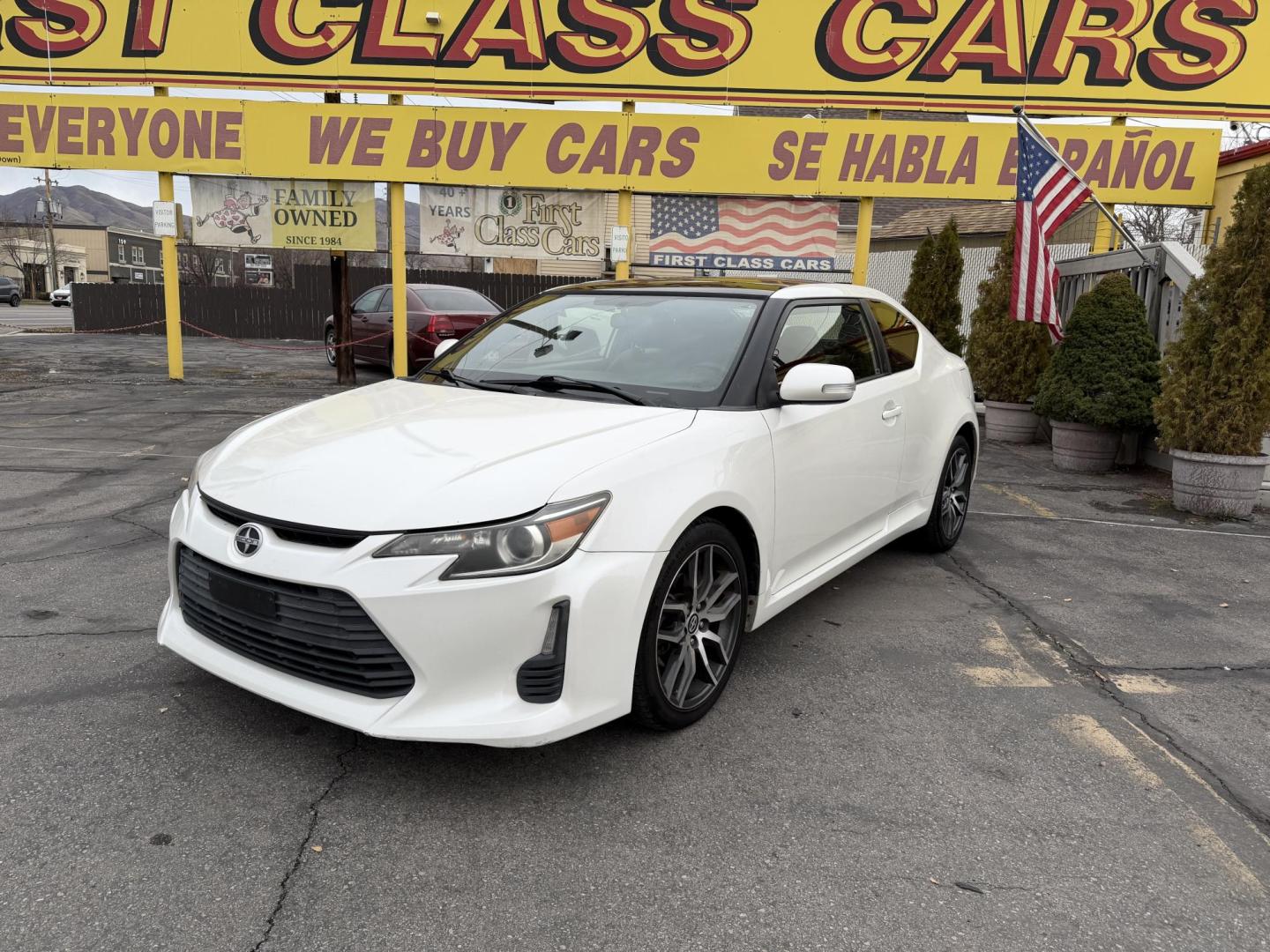 2016 Super White /Black Scion tC Sports Coupe 6-Spd AT (JTKJF5C71GJ) with an 2.4L L4 DOHC 16V engine, 6A transmission, located at 801 South State Street, Salt Lake City, UT, 84111, (801) 328-0098, 40.751953, -111.888206 - Clean title! Immaculate condition inside and out! Runs great passes all emissions testing and has been approved for up to a 5 year warranty. Has passed all inspections to get approved for the warranty that can be added on to the vehicle. Features: ABS Brakes, Air Conditioning, Alloy Wheels, AM/FM - Photo#1