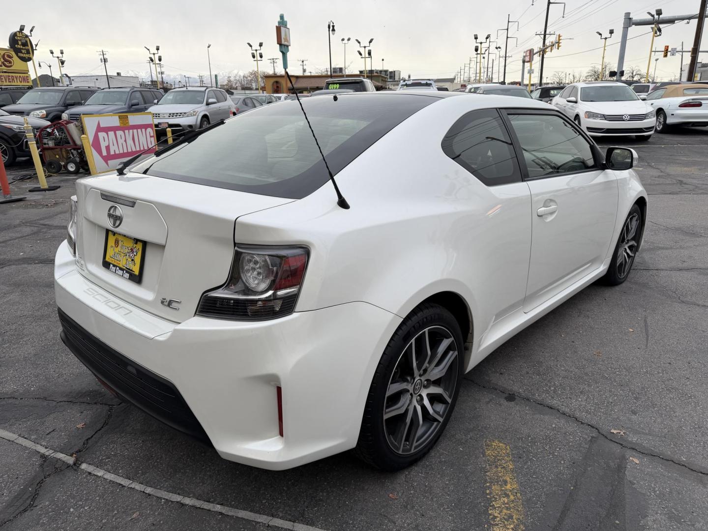 2016 Super White /Black Scion tC Sports Coupe 6-Spd AT (JTKJF5C71GJ) with an 2.4L L4 DOHC 16V engine, 6A transmission, located at 801 South State Street, Salt Lake City, UT, 84111, (801) 328-0098, 40.751953, -111.888206 - Clean title! Immaculate condition inside and out! Runs great passes all emissions testing and has been approved for up to a 5 year warranty. Has passed all inspections to get approved for the warranty that can be added on to the vehicle. Features: ABS Brakes, Air Conditioning, Alloy Wheels, AM/FM - Photo#5
