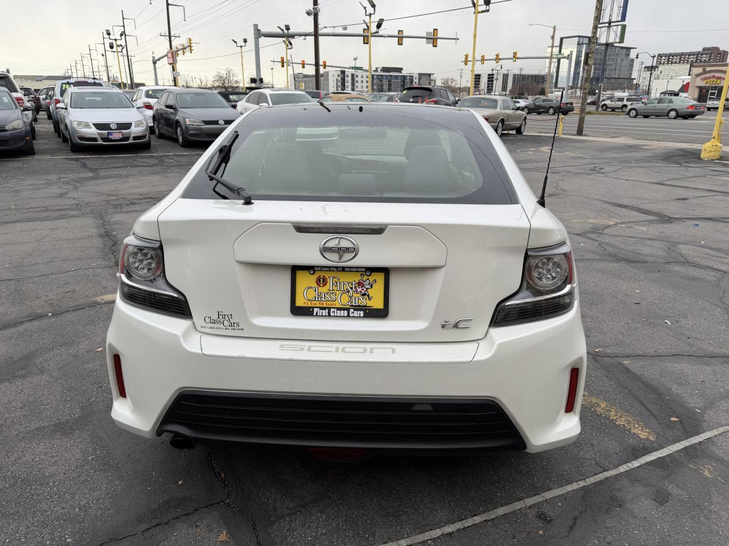 2016 Super White /Black Scion tC Sports Coupe 6-Spd AT (JTKJF5C71GJ) with an 2.4L L4 DOHC 16V engine, 6A transmission, located at 801 South State Street, Salt Lake City, UT, 84111, (801) 328-0098, 40.751953, -111.888206 - Clean title! Immaculate condition inside and out! Runs great passes all emissions testing and has been approved for up to a 5 year warranty. Has passed all inspections to get approved for the warranty that can be added on to the vehicle. Features: ABS Brakes, Air Conditioning, Alloy Wheels, AM/FM - Photo#6