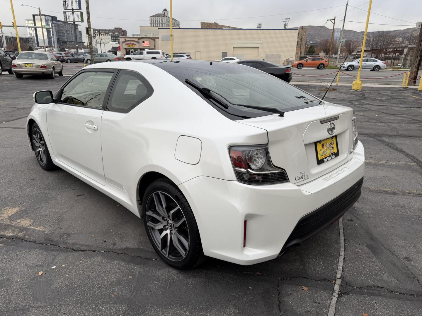 2016 Super White /Black Scion tC Sports Coupe 6-Spd AT (JTKJF5C71GJ) with an 2.4L L4 DOHC 16V engine, 6A transmission, located at 801 South State Street, Salt Lake City, UT, 84111, (801) 328-0098, 40.751953, -111.888206 - Clean title! Immaculate condition inside and out! Runs great passes all emissions testing and has been approved for up to a 5 year warranty. Has passed all inspections to get approved for the warranty that can be added on to the vehicle. Features: ABS Brakes, Air Conditioning, Alloy Wheels, AM/FM - Photo#7