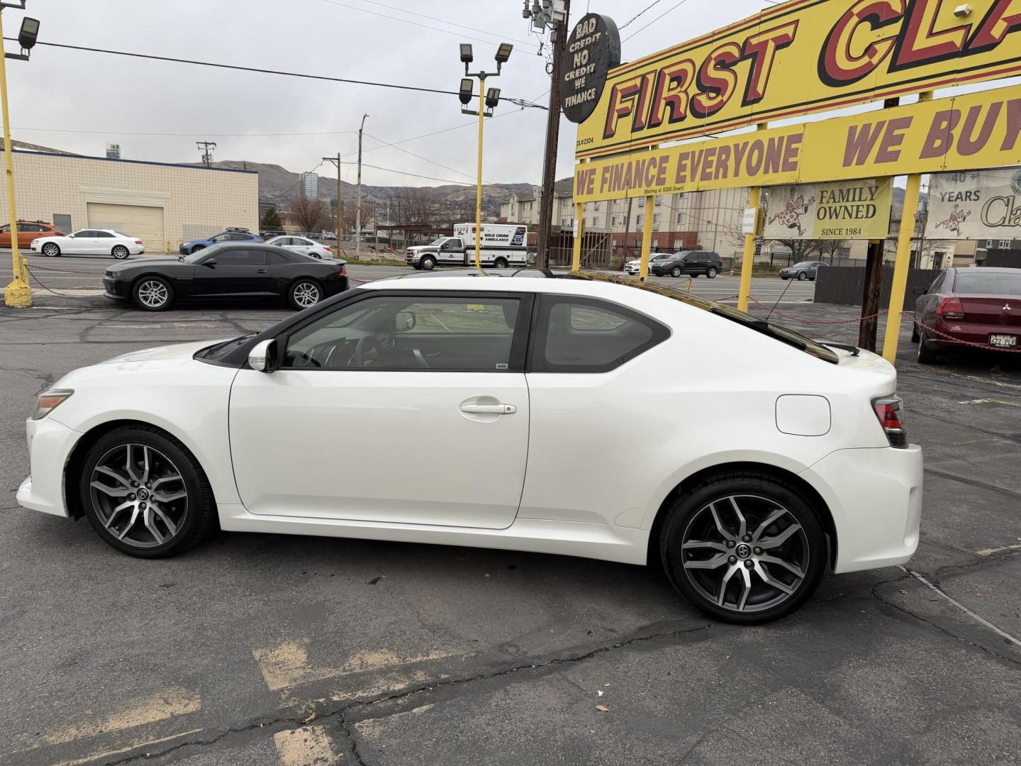2016 Super White /Black Scion tC Sports Coupe 6-Spd AT (JTKJF5C71GJ) with an 2.4L L4 DOHC 16V engine, 6A transmission, located at 801 South State Street, Salt Lake City, UT, 84111, (801) 328-0098, 40.751953, -111.888206 - Clean title! Immaculate condition inside and out! Runs great passes all emissions testing and has been approved for up to a 5 year warranty. Has passed all inspections to get approved for the warranty that can be added on to the vehicle. Features: ABS Brakes, Air Conditioning, Alloy Wheels, AM/FM - Photo#8