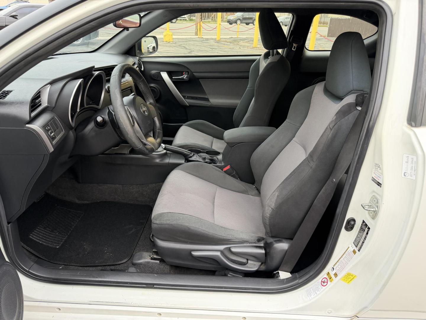 2016 Super White /Black Scion tC Sports Coupe 6-Spd AT (JTKJF5C71GJ) with an 2.4L L4 DOHC 16V engine, 6A transmission, located at 801 South State Street, Salt Lake City, UT, 84111, (801) 328-0098, 40.751953, -111.888206 - Clean title! Immaculate condition inside and out! Runs great passes all emissions testing and has been approved for up to a 5 year warranty. Has passed all inspections to get approved for the warranty that can be added on to the vehicle. Features: ABS Brakes, Air Conditioning, Alloy Wheels, AM/FM - Photo#11