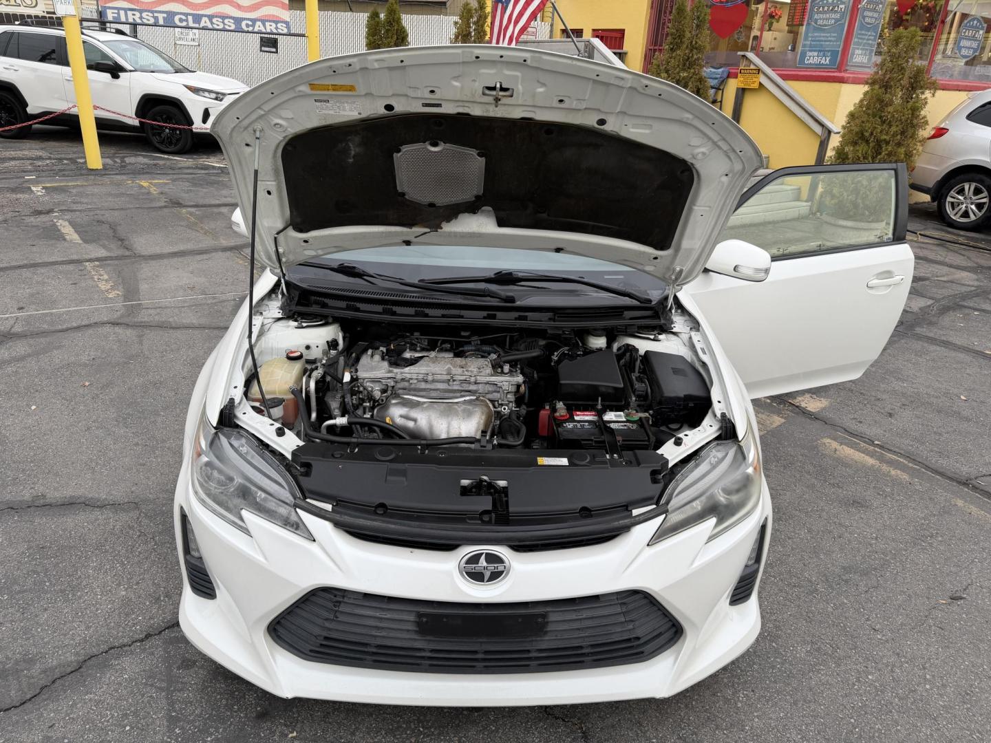 2016 Super White /Black Scion tC Sports Coupe 6-Spd AT (JTKJF5C71GJ) with an 2.4L L4 DOHC 16V engine, 6A transmission, located at 801 South State Street, Salt Lake City, UT, 84111, (801) 328-0098, 40.751953, -111.888206 - Clean title! Immaculate condition inside and out! Runs great passes all emissions testing and has been approved for up to a 5 year warranty. Has passed all inspections to get approved for the warranty that can be added on to the vehicle. Features: ABS Brakes, Air Conditioning, Alloy Wheels, AM/FM - Photo#19