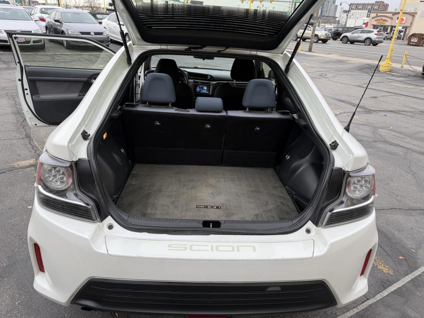 2016 Super White /Black Scion tC Sports Coupe 6-Spd AT (JTKJF5C71GJ) with an 2.4L L4 DOHC 16V engine, 6A transmission, located at 801 South State Street, Salt Lake City, UT, 84111, (801) 328-0098, 40.751953, -111.888206 - Clean title! Immaculate condition inside and out! Runs great passes all emissions testing and has been approved for up to a 5 year warranty. Has passed all inspections to get approved for the warranty that can be added on to the vehicle. Features: ABS Brakes, Air Conditioning, Alloy Wheels, AM/FM - Photo#20