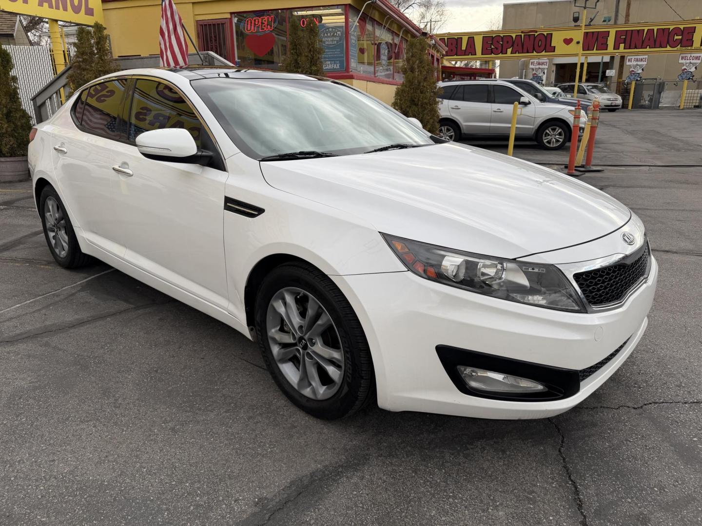 2011 Super White /Tan Kia Optima EX (KNAGN4A75B5) with an 2.4L L4 DOHC 16V engine, 6-Speed Automatic transmission, located at 801 South State Street, Salt Lake City, UT, 84111, (801) 328-0098, 40.751953, -111.888206 - Clean title! No accidents on Carfax! Carfax shows regular service was performed and maintained with the previous owners! Approved for an extended warranty that can be purchased. This vehicle has passed all inspections and qualifies for an extended warranty package. Features: A/C Seat(s), ABS Brake - Photo#3