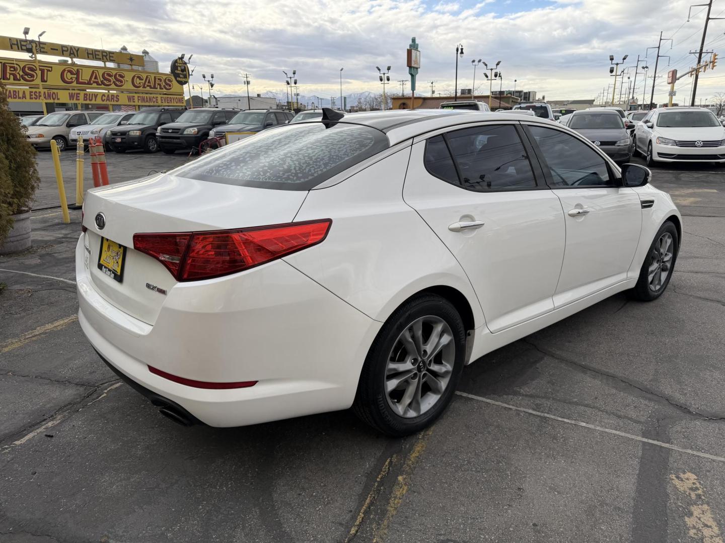 2011 Super White /Tan Kia Optima EX (KNAGN4A75B5) with an 2.4L L4 DOHC 16V engine, 6-Speed Automatic transmission, located at 801 South State Street, Salt Lake City, UT, 84111, (801) 328-0098, 40.751953, -111.888206 - Clean title! No accidents on Carfax! Carfax shows regular service was performed and maintained with the previous owners! Approved for an extended warranty that can be purchased. This vehicle has passed all inspections and qualifies for an extended warranty package. Features: A/C Seat(s), ABS Brake - Photo#5