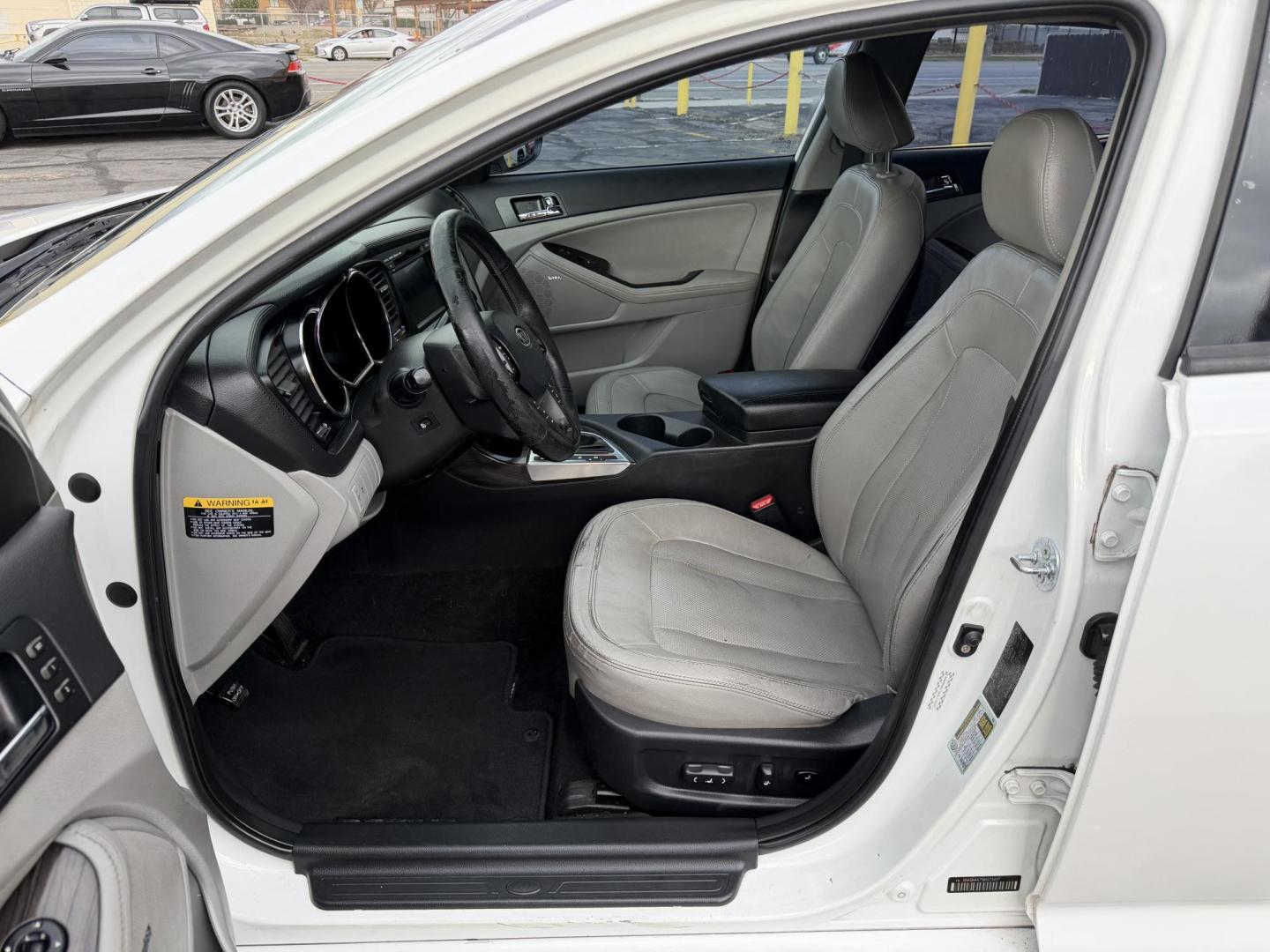 2011 Super White /Tan Kia Optima EX (KNAGN4A75B5) with an 2.4L L4 DOHC 16V engine, 6-Speed Automatic transmission, located at 801 South State Street, Salt Lake City, UT, 84111, (801) 328-0098, 40.751953, -111.888206 - Clean title! No accidents on Carfax! Carfax shows regular service was performed and maintained with the previous owners! Approved for an extended warranty that can be purchased. This vehicle has passed all inspections and qualifies for an extended warranty package. Features: A/C Seat(s), ABS Brake - Photo#10