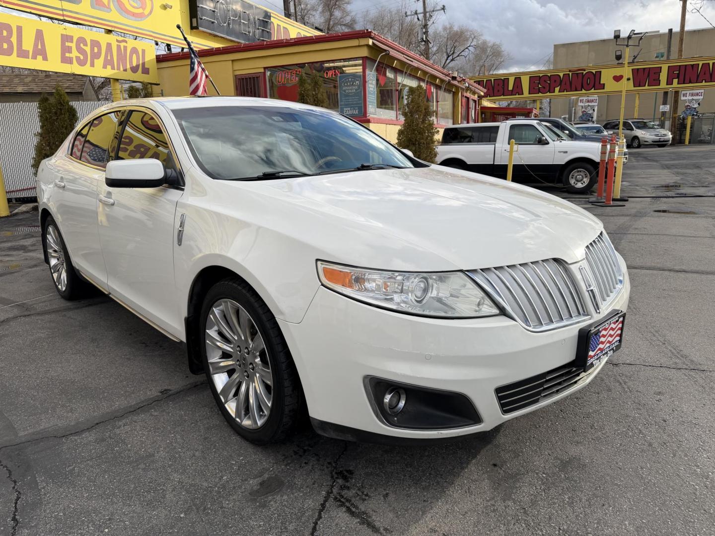 2009 Super White /Tan Lincoln MKS FWD (1LNHM93RX9G) with an 3.7L V6 DOHC 24V engine, 6-Speed Automatic Overdrive transmission, located at 801 South State Street, Salt Lake City, UT, 84111, (801) 328-0098, 40.751953, -111.888206 - Clean title! No accidents on the Carfax history report. Carfax shows regular maintenance and service has been performed. Approved for up to a 5 year extended warranty that can be purchased in addition to the vehicle. Has passed all vehicle inspections and approved for up an extended warranty plan th - Photo#3