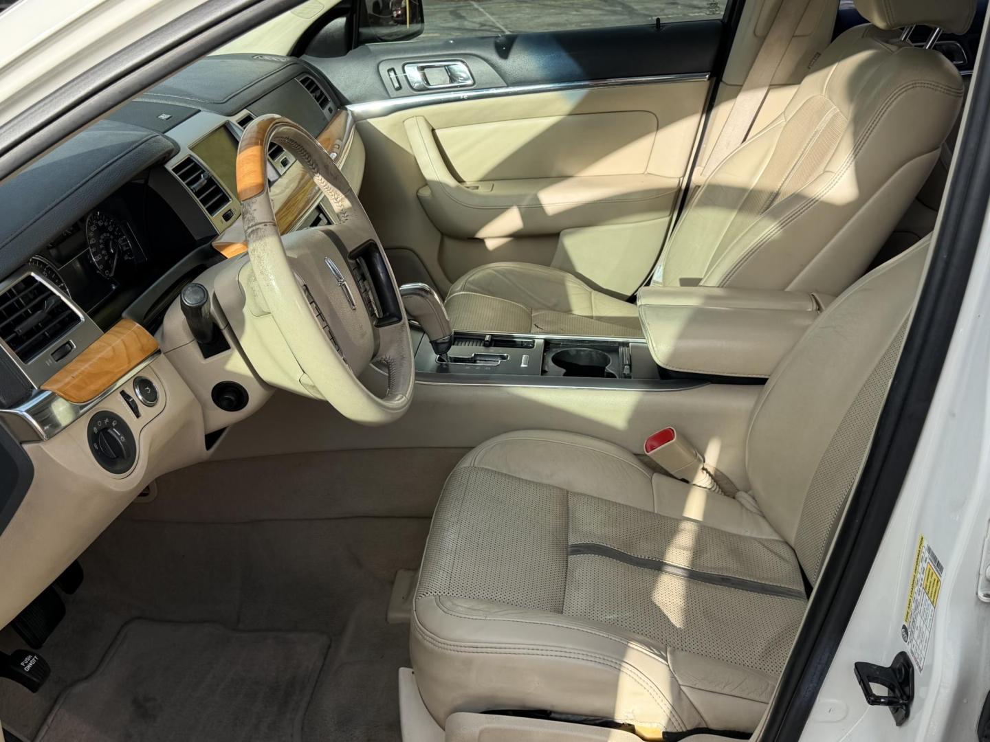 2009 Super White /Tan Lincoln MKS FWD (1LNHM93RX9G) with an 3.7L V6 DOHC 24V engine, 6-Speed Automatic Overdrive transmission, located at 801 South State Street, Salt Lake City, UT, 84111, (801) 328-0098, 40.751953, -111.888206 - Clean title! No accidents on the Carfax history report. Carfax shows regular maintenance and service has been performed. Approved for up to a 5 year extended warranty that can be purchased in addition to the vehicle. Has passed all vehicle inspections and approved for up an extended warranty plan th - Photo#11