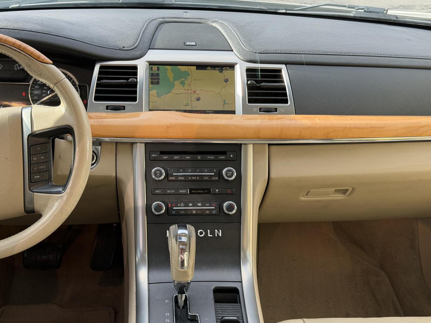 2009 Super White /Tan Lincoln MKS FWD (1LNHM93RX9G) with an 3.7L V6 DOHC 24V engine, 6-Speed Automatic Overdrive transmission, located at 801 South State Street, Salt Lake City, UT, 84111, (801) 328-0098, 40.751953, -111.888206 - Clean title! No accidents on the Carfax history report. Carfax shows regular maintenance and service has been performed. Approved for up to a 5 year extended warranty that can be purchased in addition to the vehicle. Has passed all vehicle inspections and approved for up an extended warranty plan th - Photo#13