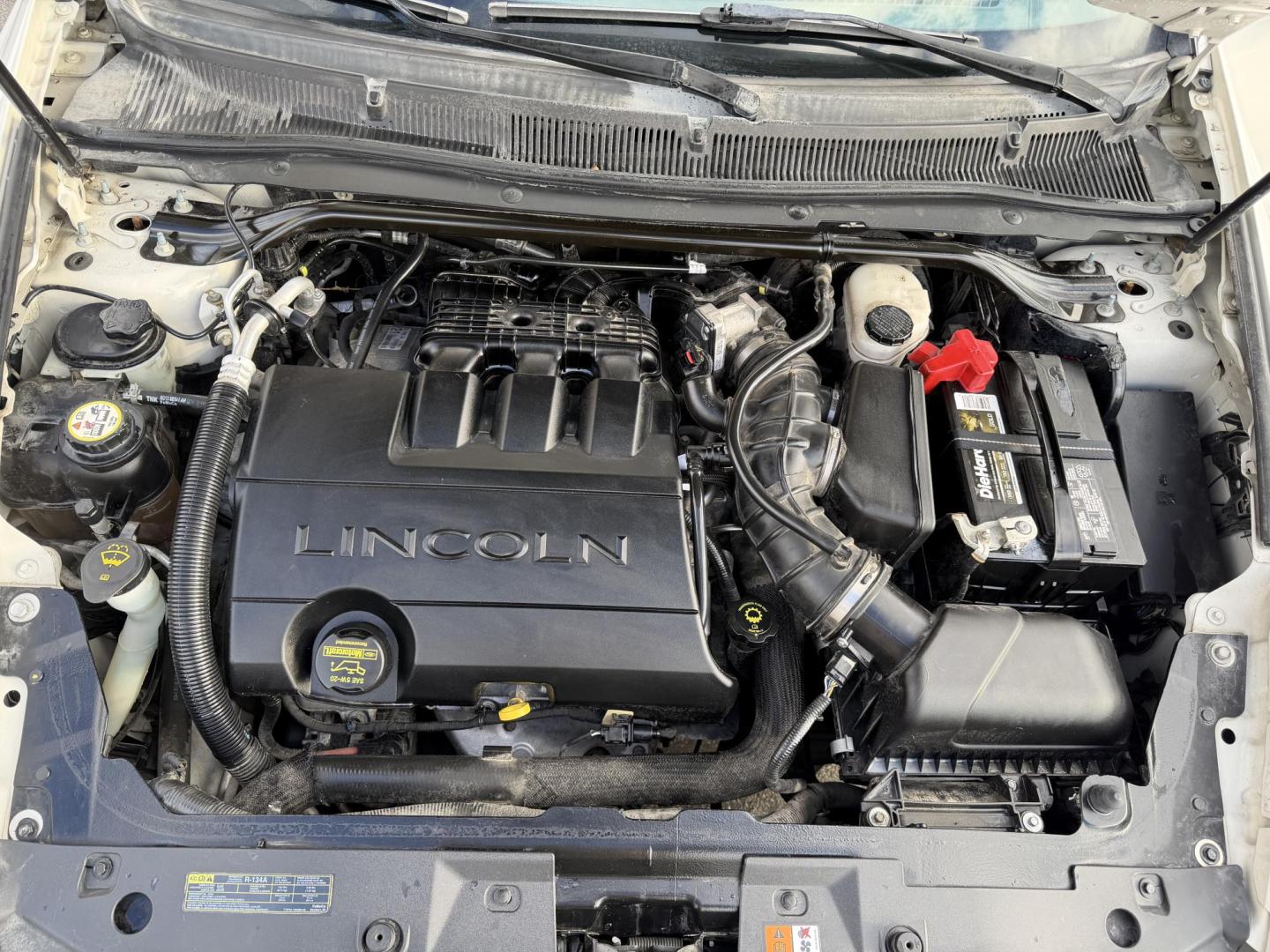 2009 Super White /Tan Lincoln MKS FWD (1LNHM93RX9G) with an 3.7L V6 DOHC 24V engine, 6-Speed Automatic Overdrive transmission, located at 801 South State Street, Salt Lake City, UT, 84111, (801) 328-0098, 40.751953, -111.888206 - Clean title! No accidents on the Carfax history report. Carfax shows regular maintenance and service has been performed. Approved for up to a 5 year extended warranty that can be purchased in addition to the vehicle. Has passed all vehicle inspections and approved for up an extended warranty plan th - Photo#24