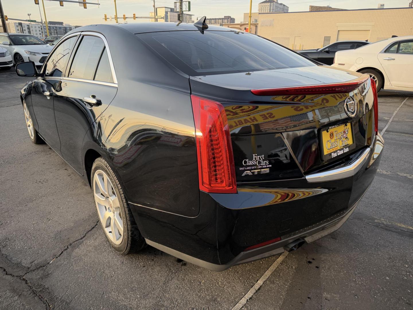 2014 Black /Black Cadillac ATS 2.5L Standard RWD (1G6AA5RA1E0) with an 2.5L L4 DOHC 16V engine, 6-Speed Automatic transmission, located at 801 South State Street, Salt Lake City, UT, 84111, (801) 328-0098, 40.751953, -111.888206 - Clean title! No accidents on Carfax! Only 1 owner on the Carfax! Carfax shows this vehicle has been maintained and taken care of. Carfax shows regular oil changes and regular service intervals were performed. Features: ABS Brakes, Air Conditioning, Alloy Wheels, AM/FM Stereo, Automatic Transmissio - Photo#7