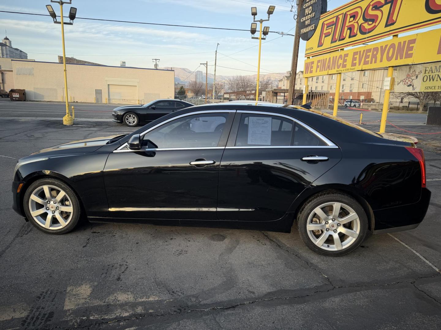 2014 Black /Black Cadillac ATS 2.5L Standard RWD (1G6AA5RA1E0) with an 2.5L L4 DOHC 16V engine, 6-Speed Automatic transmission, located at 801 South State Street, Salt Lake City, UT, 84111, (801) 328-0098, 40.751953, -111.888206 - Clean title! No accidents on Carfax! Only 1 owner on the Carfax! Carfax shows this vehicle has been maintained and taken care of. Carfax shows regular oil changes and regular service intervals were performed. Features: ABS Brakes, Air Conditioning, Alloy Wheels, AM/FM Stereo, Automatic Transmissio - Photo#8