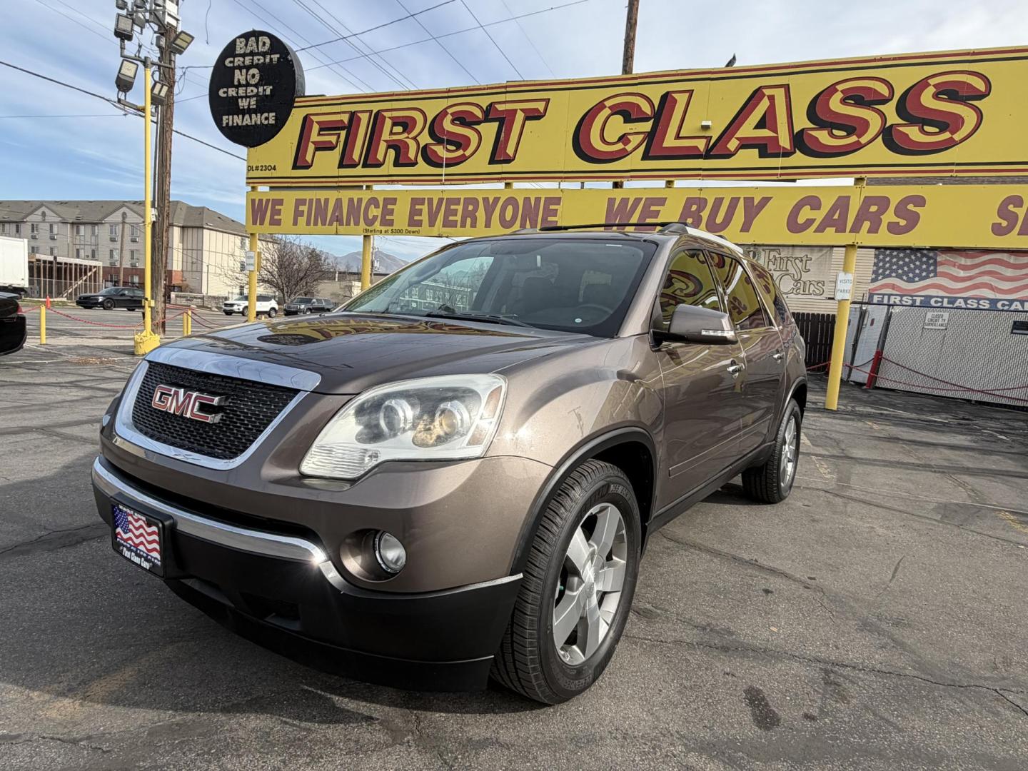 2011 Harvest Gold Metallic /Black GMC Acadia SLT-1 AWD (1GKKVRED7BJ) with an 3.6L V6 DOHC 24V engine, 6-Speed Automatic transmission, located at 801 South State Street, Salt Lake City, UT, 84111, (801) 328-0098, 40.751953, -111.888206 - Clean Title! Immaculate condition inside and out! All Wheel Drive great in the snow! DVD system in the rear entertainment, Bose sound system, rear backup camera! Lots of extras! Must see for anyone looking for a clean affordable SUV!!!! Features: 4WD/AWD, ABS Brakes, Air Conditioning, Alloy Wheels - Photo#1