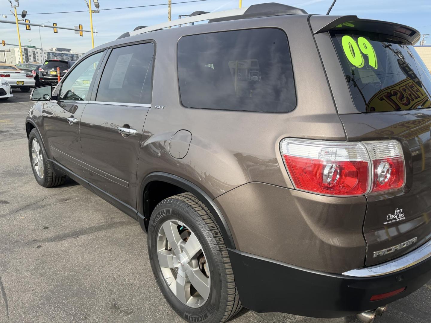 2011 Harvest Gold Metallic /Black GMC Acadia SLT-1 AWD (1GKKVRED7BJ) with an 3.6L V6 DOHC 24V engine, 6-Speed Automatic transmission, located at 801 South State Street, Salt Lake City, UT, 84111, (801) 328-0098, 40.751953, -111.888206 - Clean Title! Immaculate condition inside and out! All Wheel Drive great in the snow! DVD system in the rear entertainment, Bose sound system, rear backup camera! Lots of extras! Must see for anyone looking for a clean affordable SUV!!!! Features: 4WD/AWD, ABS Brakes, Air Conditioning, Alloy Wheels - Photo#6