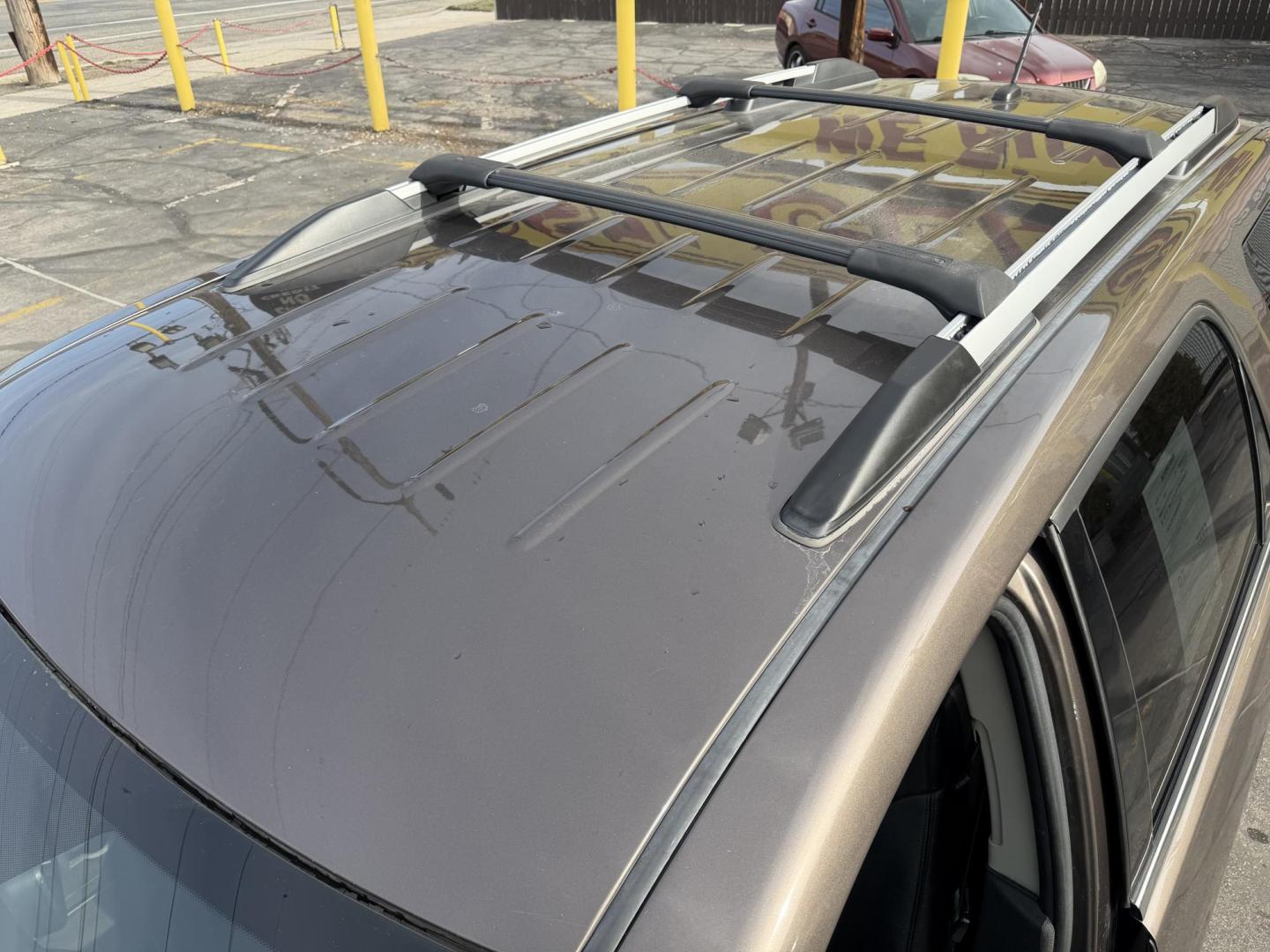 2011 Harvest Gold Metallic /Black GMC Acadia SLT-1 AWD (1GKKVRED7BJ) with an 3.6L V6 DOHC 24V engine, 6-Speed Automatic transmission, located at 801 South State Street, Salt Lake City, UT, 84111, (801) 328-0098, 40.751953, -111.888206 - Clean Title! Immaculate condition inside and out! All Wheel Drive great in the snow! DVD system in the rear entertainment, Bose sound system, rear backup camera! Lots of extras! Must see for anyone looking for a clean affordable SUV!!!! Features: 4WD/AWD, ABS Brakes, Air Conditioning, Alloy Wheels - Photo#26