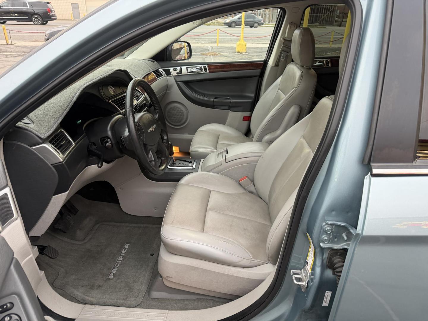 2008 French Blue Metallic /Tan Chrysler Pacifica Touring AWD (2A8GF68X78R) with an 4.0L V6 SOHC 24V engine, 6-Speed Automatic Overdrive transmission, located at 801 South State Street, Salt Lake City, UT, 84111, (801) 328-0098, 40.751953, -111.888206 - Excellent condition inside and out! Clean title! Must see affordable all wheel drive SUV in excellent condition inside and out! Loaded with lots of extras! Features: 4WD/AWD, ABS Brakes, Air Conditioning, Alloy Wheels, AM/FM Stereo, Automatic Transmission, Auxiliary Audio Input, CD Audio, Cruise C - Photo#9