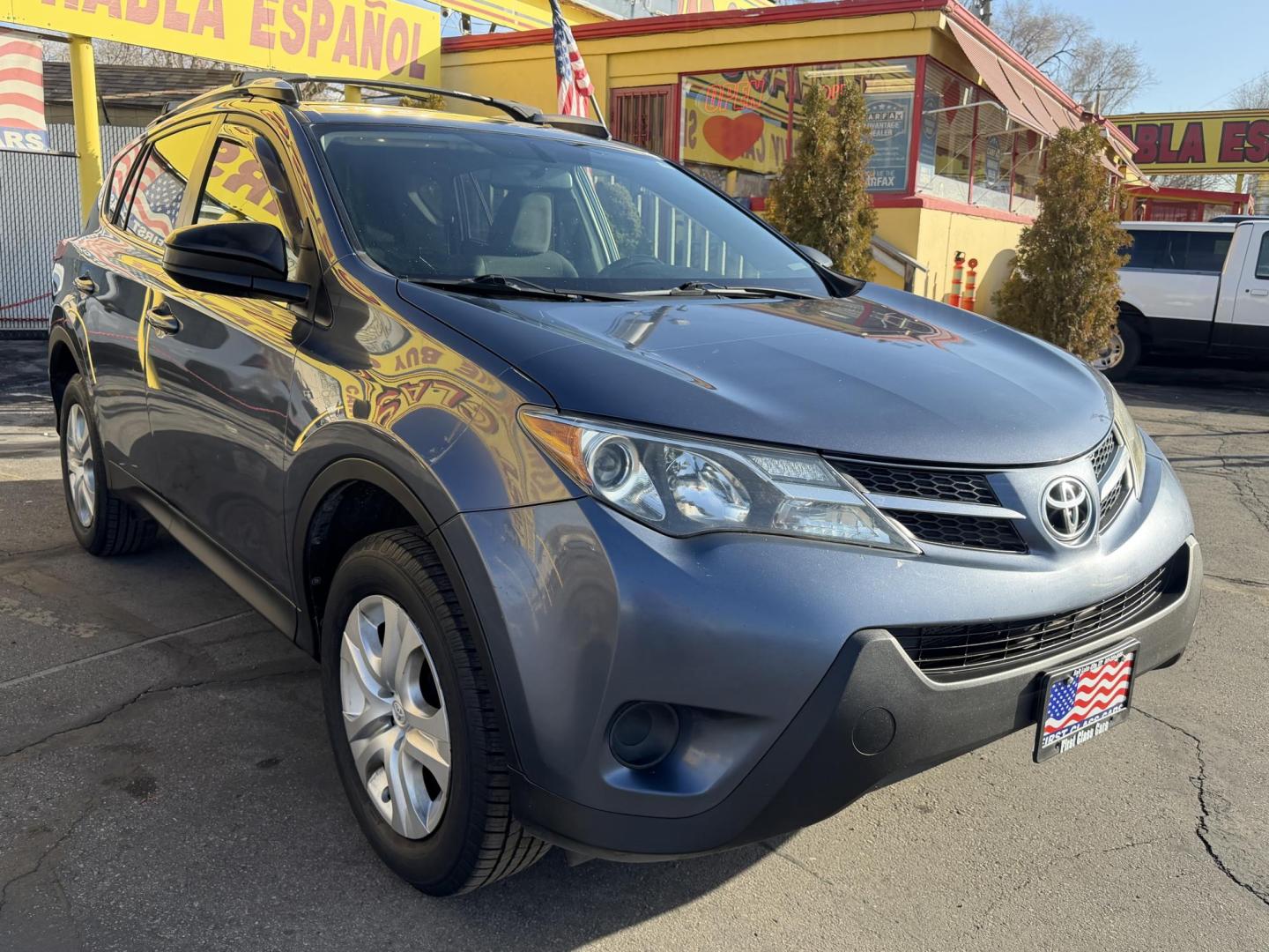 2014 Bluestone Metallic /Black Toyota RAV4 LE AWD (JTMBFREV9ED) with an 2.5L L4 DOHC 16V engine, 6-Speed Automatic transmission, located at 801 South State Street, Salt Lake City, UT, 84111, (801) 328-0098, 40.751953, -111.888206 - Clean title! Great condition inside and out runs great! Good affordable Toyota SUV with AWD (all wheel drive) hard to find in this price range!!! You can buy a 3 month 3,000 mile powertrain warranty and up to 1 year 12,000 miles warranty is available! It has passed all inspections and approved for w - Photo#3
