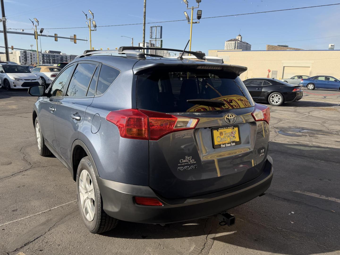 2014 Bluestone Metallic /Black Toyota RAV4 LE AWD (JTMBFREV9ED) with an 2.5L L4 DOHC 16V engine, 6-Speed Automatic transmission, located at 801 South State Street, Salt Lake City, UT, 84111, (801) 328-0098, 40.751953, -111.888206 - Clean title! Great condition inside and out runs great! Good affordable Toyota SUV with AWD (all wheel drive) hard to find in this price range!!! You can buy a 3 month 3,000 mile powertrain warranty and up to 1 year 12,000 miles warranty is available! It has passed all inspections and approved for w - Photo#7