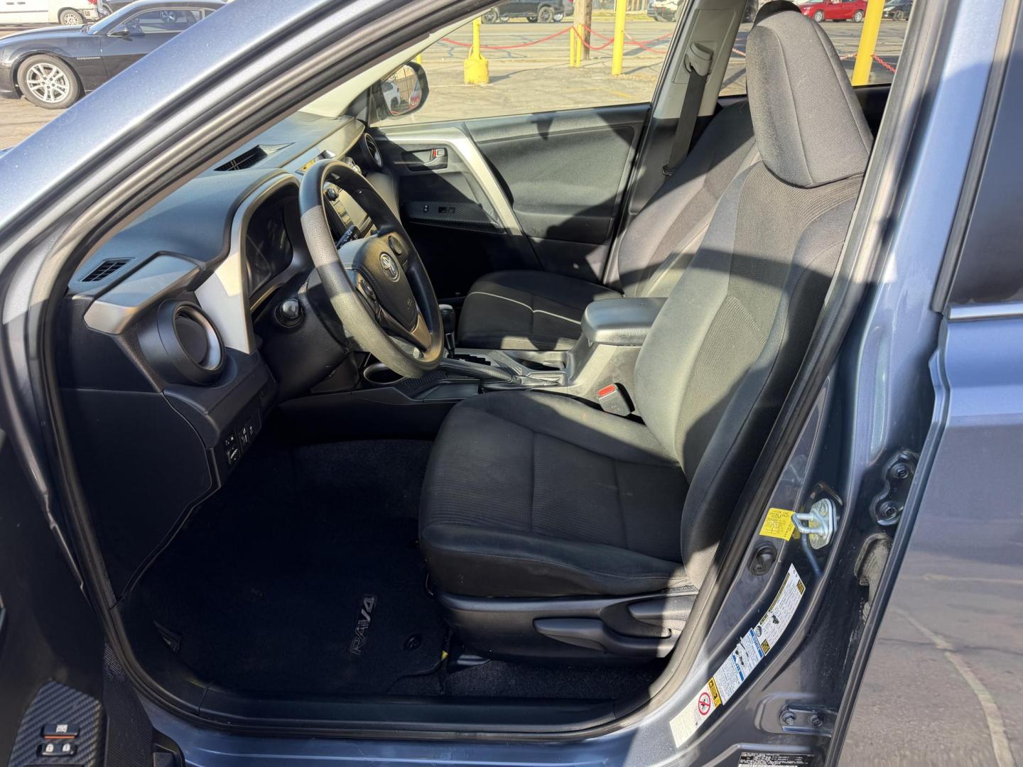 2014 Bluestone Metallic /Black Toyota RAV4 LE AWD (JTMBFREV9ED) with an 2.5L L4 DOHC 16V engine, 6-Speed Automatic transmission, located at 801 South State Street, Salt Lake City, UT, 84111, (801) 328-0098, 40.751953, -111.888206 - Clean title! Great condition inside and out runs great! Good affordable Toyota SUV with AWD (all wheel drive) hard to find in this price range!!! You can buy a 3 month 3,000 mile powertrain warranty and up to 1 year 12,000 miles warranty is available! It has passed all inspections and approved for w - Photo#11