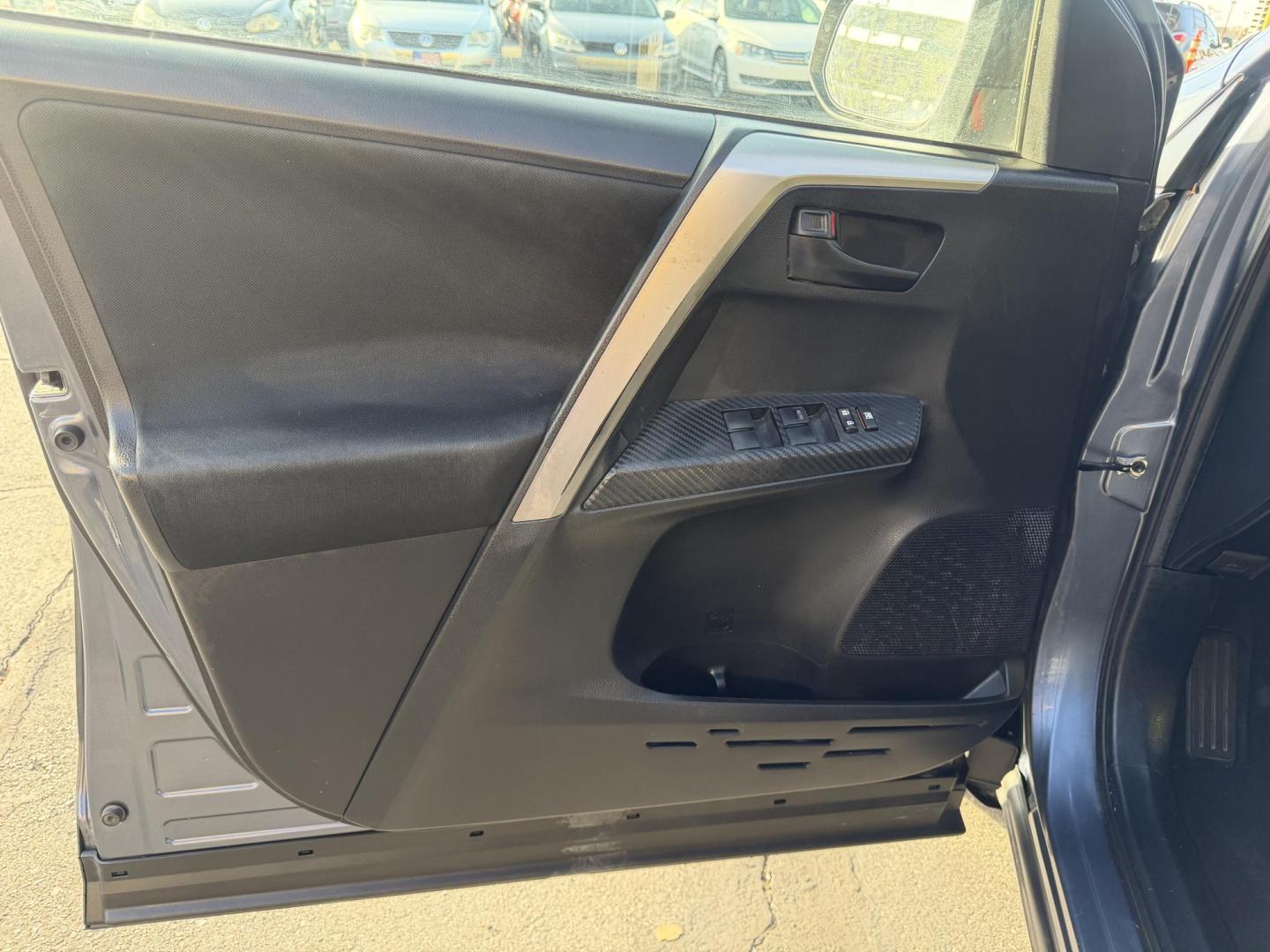 2014 Bluestone Metallic /Black Toyota RAV4 LE AWD (JTMBFREV9ED) with an 2.5L L4 DOHC 16V engine, 6-Speed Automatic transmission, located at 801 South State Street, Salt Lake City, UT, 84111, (801) 328-0098, 40.751953, -111.888206 - Clean title! Great condition inside and out runs great! Good affordable Toyota SUV with AWD (all wheel drive) hard to find in this price range!!! You can buy a 3 month 3,000 mile powertrain warranty and up to 1 year 12,000 miles warranty is available! It has passed all inspections and approved for w - Photo#18