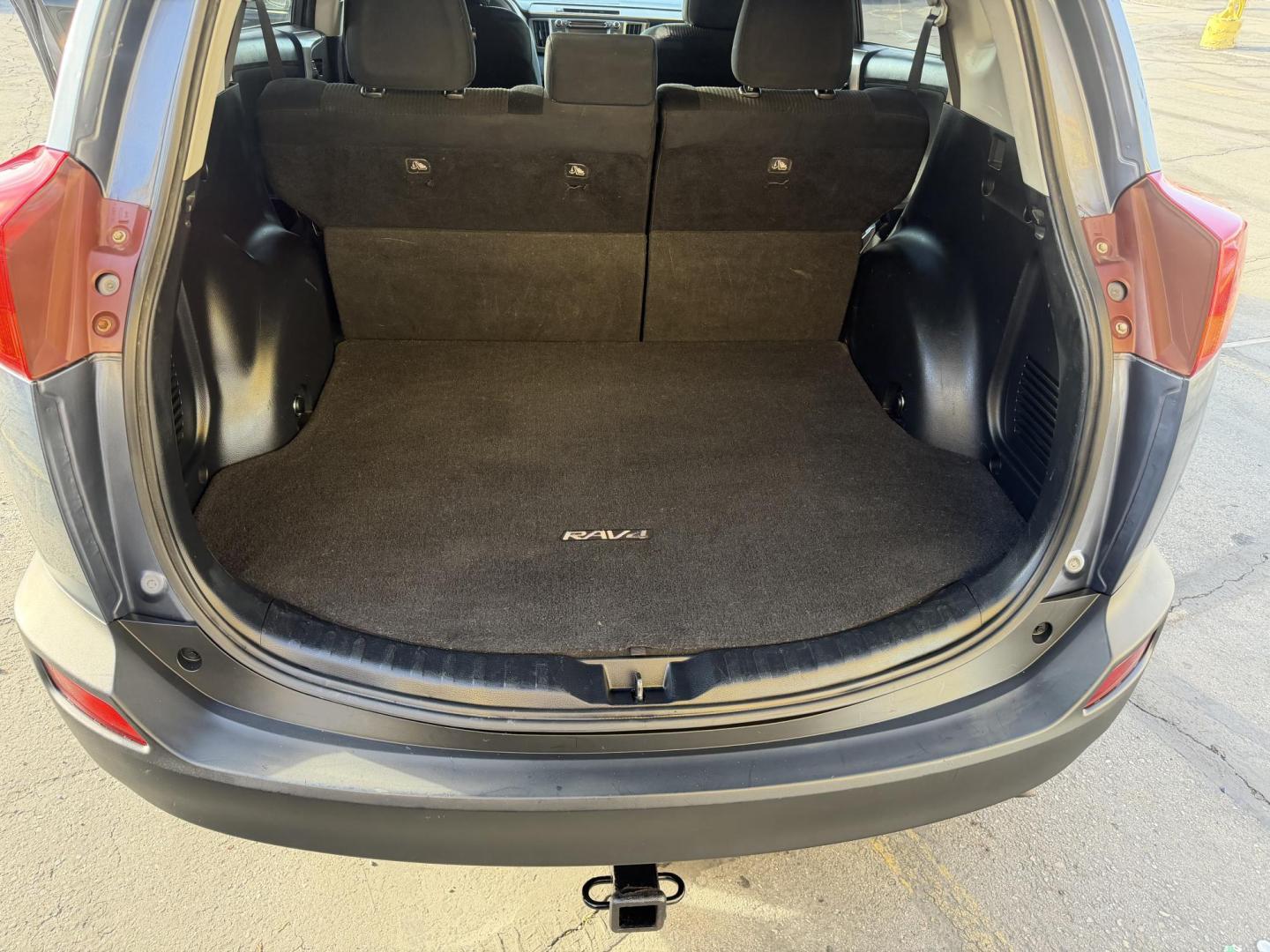 2014 Bluestone Metallic /Black Toyota RAV4 LE AWD (JTMBFREV9ED) with an 2.5L L4 DOHC 16V engine, 6-Speed Automatic transmission, located at 801 South State Street, Salt Lake City, UT, 84111, (801) 328-0098, 40.751953, -111.888206 - Clean title! Great condition inside and out runs great! Good affordable Toyota SUV with AWD (all wheel drive) hard to find in this price range!!! You can buy a 3 month 3,000 mile powertrain warranty and up to 1 year 12,000 miles warranty is available! It has passed all inspections and approved for w - Photo#25