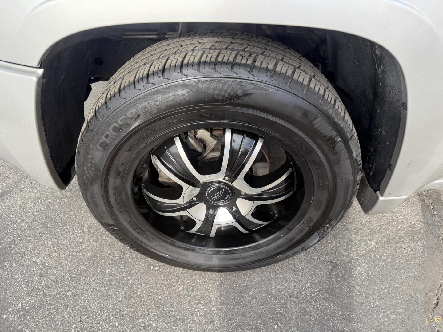 2006 Silver Sky Metallic /Gray GMC Envoy SLE 4WD (1GKDT13S762) with an 4.2L L6 DOHC 24V engine, 4-Speed Automatic Overdrive transmission, located at 801 South State Street, Salt Lake City, UT, 84111, (801) 328-0098, 40.751953, -111.888206 - Clean Title!!! 4x4 SUV Great in the snow and all around year! Good tires. Great shape this is an affordable suv that has been maintained and cared for. Passed all mechanical inspections and approved for up to a 5 year warranty that can be added onto the vehicle price. Features: 4x4, Leather seats, - Photo#10