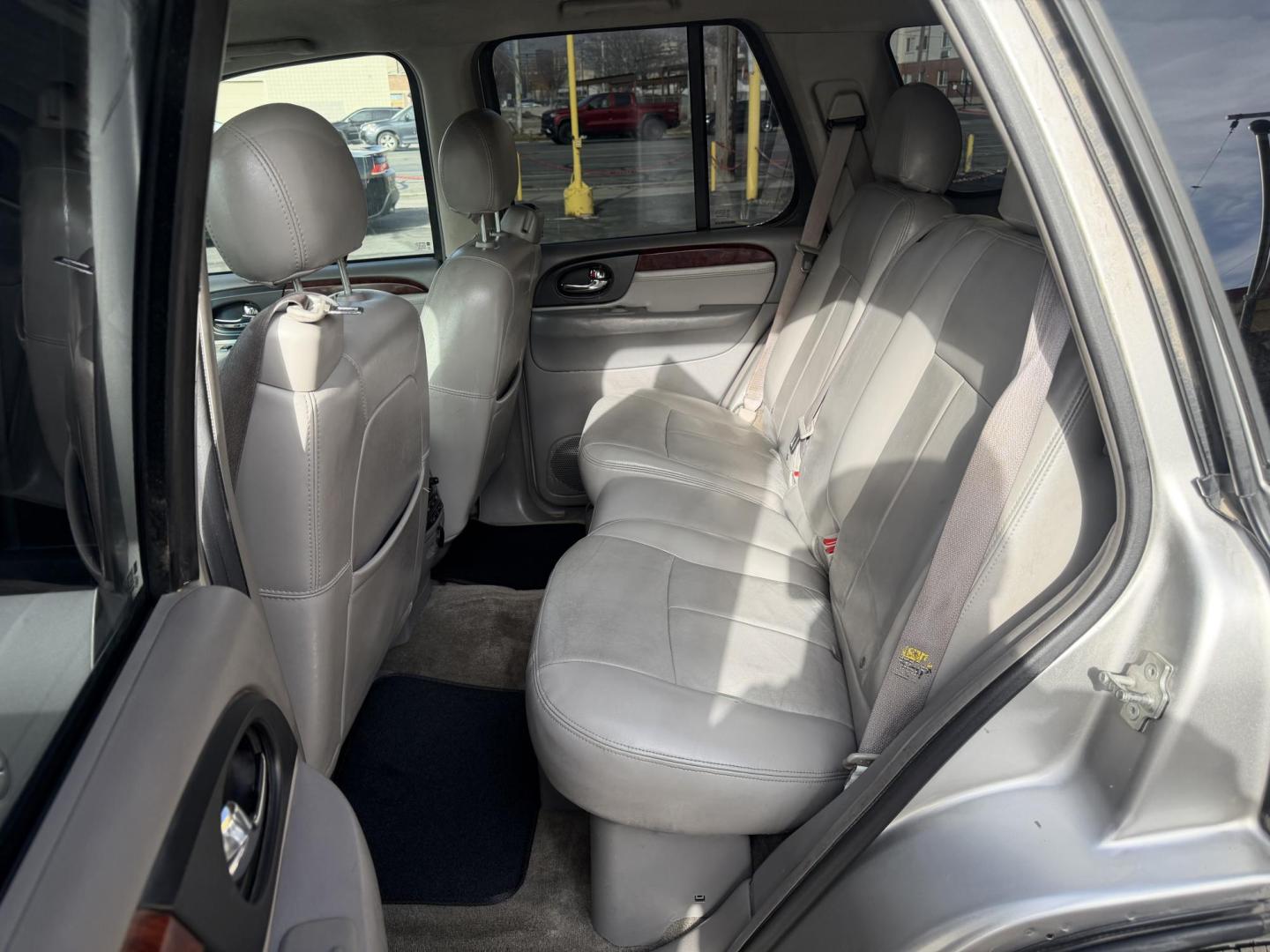 2006 Silver Sky Metallic /Gray GMC Envoy SLE 4WD (1GKDT13S762) with an 4.2L L6 DOHC 24V engine, 4-Speed Automatic Overdrive transmission, located at 801 South State Street, Salt Lake City, UT, 84111, (801) 328-0098, 40.751953, -111.888206 - Clean Title!!! 4x4 SUV Great in the snow and all around year! Good tires. Great shape this is an affordable suv that has been maintained and cared for. Passed all mechanical inspections and approved for up to a 5 year warranty that can be added onto the vehicle price. Features: 4x4, Leather seats, - Photo#13