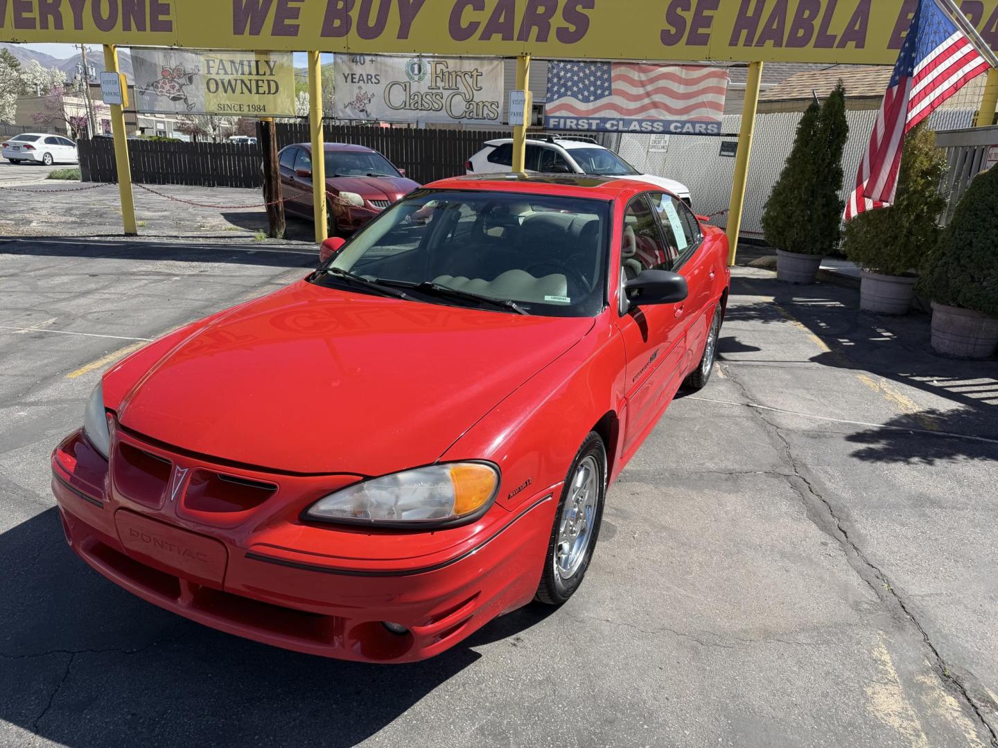 2002 Rallye Red /Black Pontiac Grand AM GT1 sedan (1G2NV52E02C) with an 3.4L V6 OHV 12V engine, 4-Speed Automatic Overdrive transmission, located at 801 South State Street, Salt Lake City, UT, 84111, (801) 328-0098, 40.751953, -111.888206 - Certified Carfax 1-Owner car!!! Clean title! No accidents on Carfax! Immaculate condition inside and out for the year. Hard to find this clean in this condition, vehicle has been meticulously maintained and cared for. Certified for up to a 5 year bumper warranty that can be added onto the vehicle, a - Photo#2
