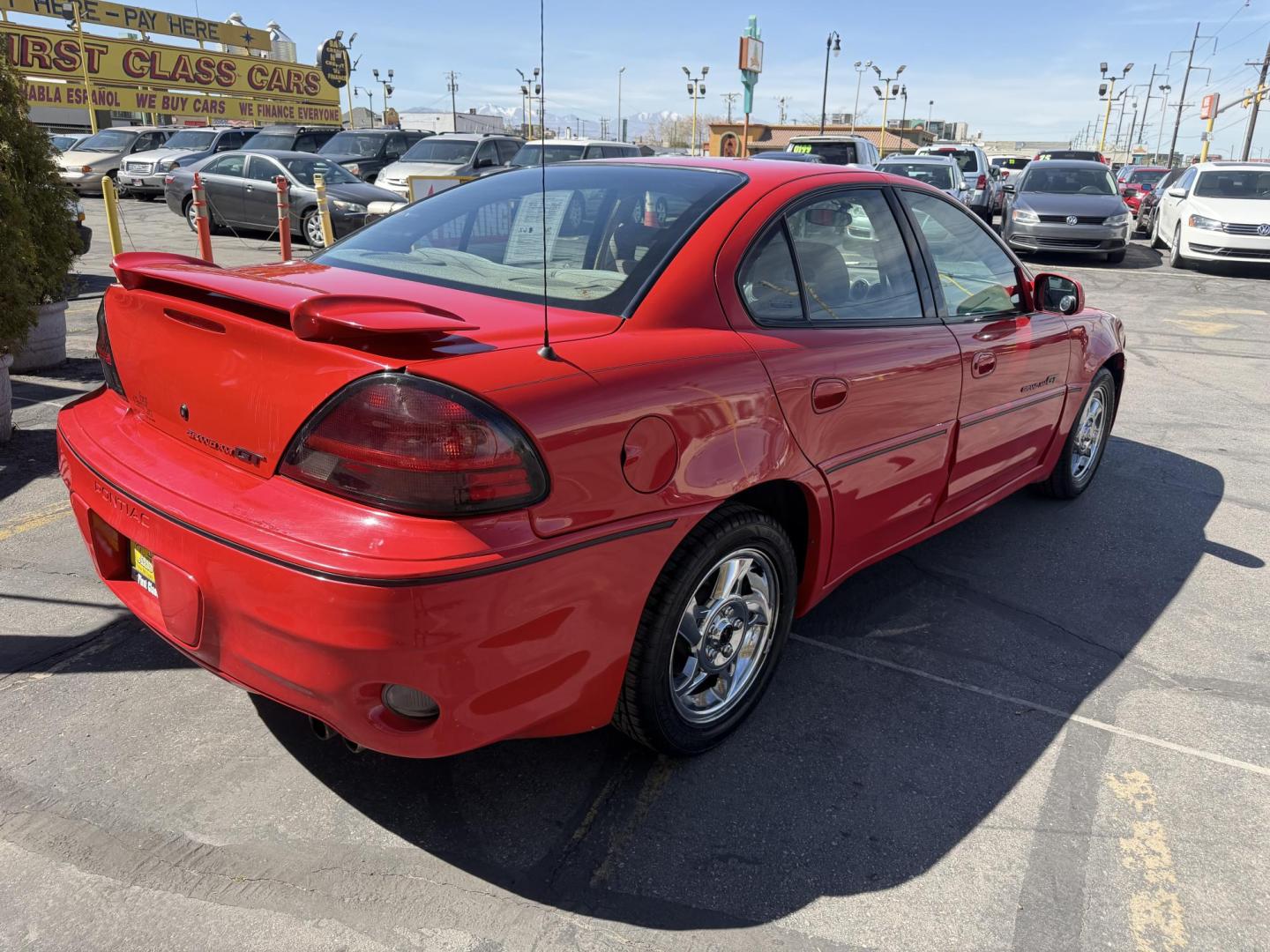 2002 Rallye Red /Black Pontiac Grand AM GT1 sedan (1G2NV52E02C) with an 3.4L V6 OHV 12V engine, 4-Speed Automatic Overdrive transmission, located at 801 South State Street, Salt Lake City, UT, 84111, (801) 328-0098, 40.751953, -111.888206 - Certified Carfax 1-Owner car!!! Clean title! No accidents on Carfax! Immaculate condition inside and out for the year. Hard to find this clean in this condition, vehicle has been meticulously maintained and cared for. Certified for up to a 5 year bumper warranty that can be added onto the vehicle, a - Photo#7