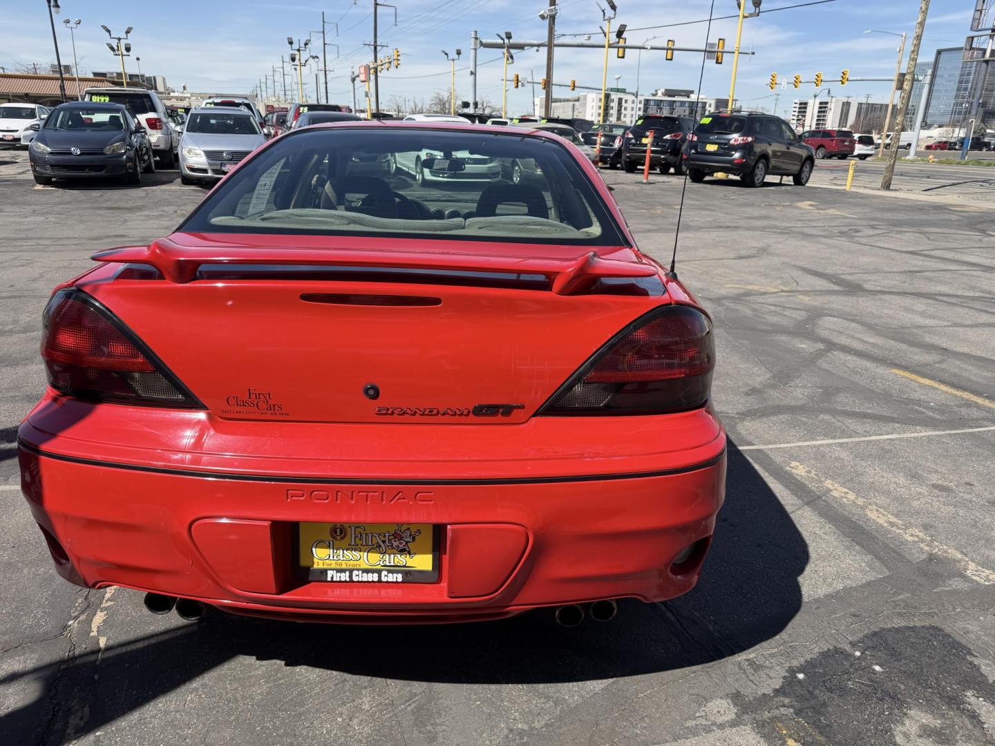 2002 Rallye Red /Black Pontiac Grand AM GT1 sedan (1G2NV52E02C) with an 3.4L V6 OHV 12V engine, 4-Speed Automatic Overdrive transmission, located at 801 South State Street, Salt Lake City, UT, 84111, (801) 328-0098, 40.751953, -111.888206 - Certified Carfax 1-Owner car!!! Clean title! No accidents on Carfax! Immaculate condition inside and out for the year. Hard to find this clean in this condition, vehicle has been meticulously maintained and cared for. Certified for up to a 5 year bumper warranty that can be added onto the vehicle, a - Photo#8