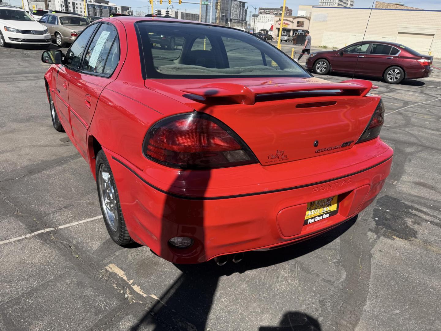 2002 Rallye Red /Black Pontiac Grand AM GT1 sedan (1G2NV52E02C) with an 3.4L V6 OHV 12V engine, 4-Speed Automatic Overdrive transmission, located at 801 South State Street, Salt Lake City, UT, 84111, (801) 328-0098, 40.751953, -111.888206 - Certified Carfax 1-Owner car!!! Clean title! No accidents on Carfax! Immaculate condition inside and out for the year. Hard to find this clean in this condition, vehicle has been meticulously maintained and cared for. Certified for up to a 5 year bumper warranty that can be added onto the vehicle, a - Photo#9