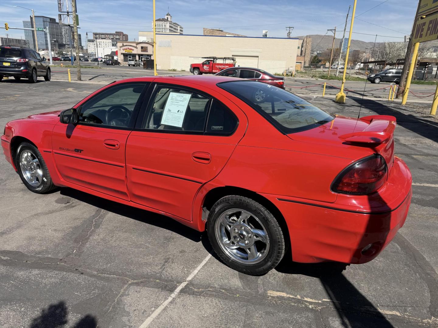 2002 Rallye Red /Black Pontiac Grand AM GT1 sedan (1G2NV52E02C) with an 3.4L V6 OHV 12V engine, 4-Speed Automatic Overdrive transmission, located at 801 South State Street, Salt Lake City, UT, 84111, (801) 328-0098, 40.751953, -111.888206 - Certified Carfax 1-Owner car!!! Clean title! No accidents on Carfax! Immaculate condition inside and out for the year. Hard to find this clean in this condition, vehicle has been meticulously maintained and cared for. Certified for up to a 5 year bumper warranty that can be added onto the vehicle, a - Photo#10