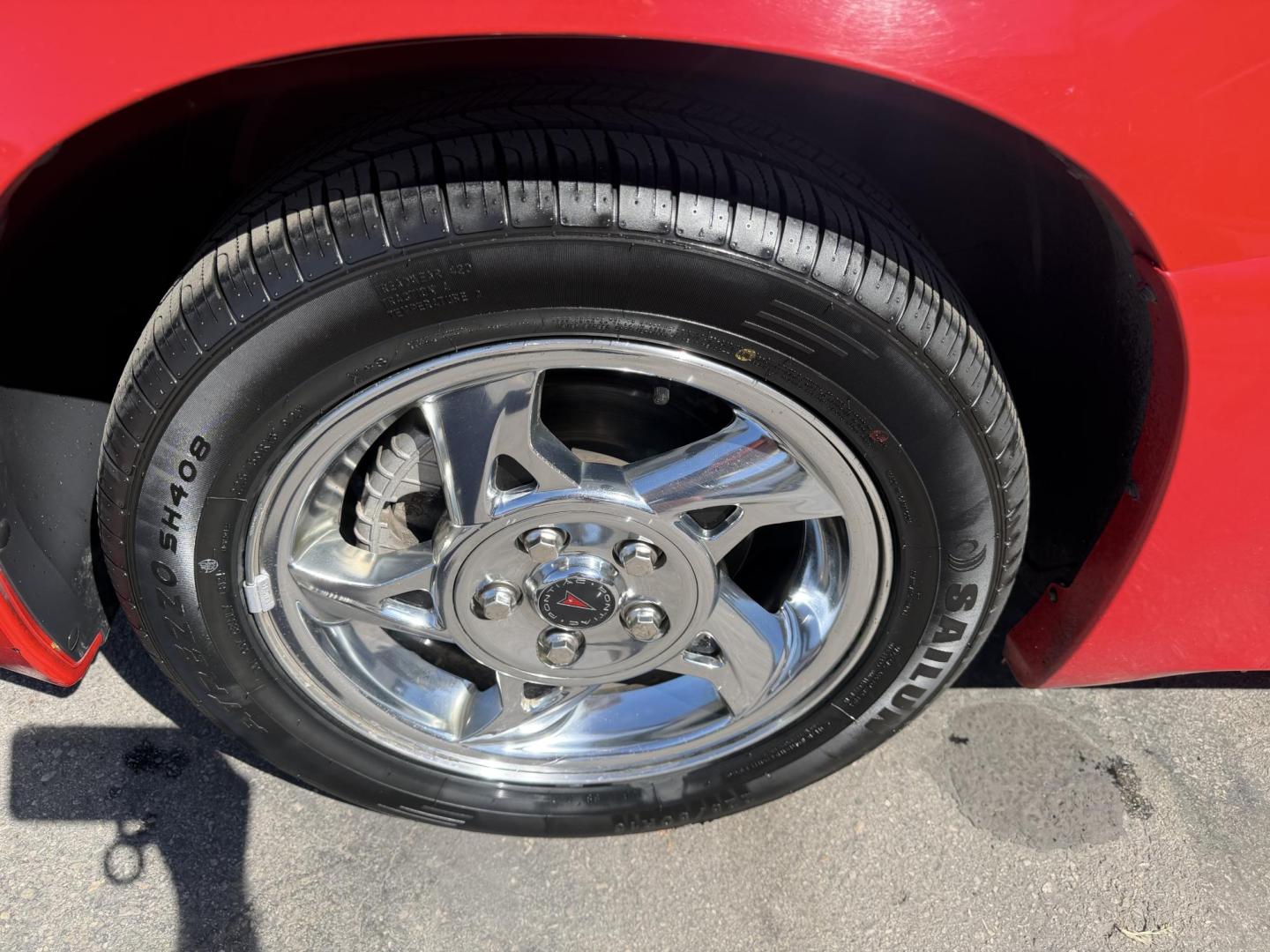 2002 Rallye Red /Black Pontiac Grand AM GT1 sedan (1G2NV52E02C) with an 3.4L V6 OHV 12V engine, 4-Speed Automatic Overdrive transmission, located at 801 South State Street, Salt Lake City, UT, 84111, (801) 328-0098, 40.751953, -111.888206 - Certified Carfax 1-Owner car!!! Clean title! No accidents on Carfax! Immaculate condition inside and out for the year. Hard to find this clean in this condition, vehicle has been meticulously maintained and cared for. Certified for up to a 5 year bumper warranty that can be added onto the vehicle, a - Photo#12