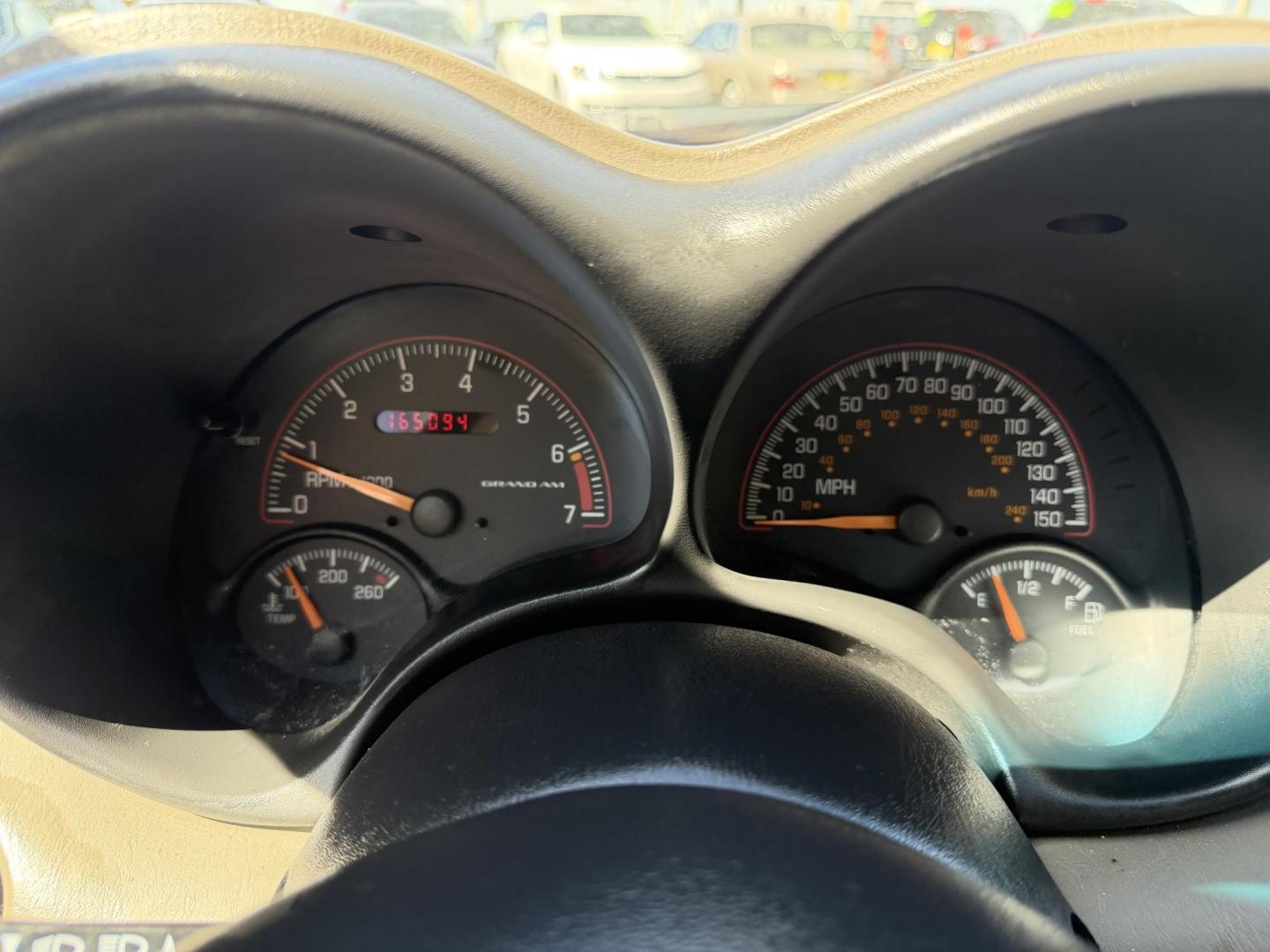 2002 Rallye Red /Black Pontiac Grand AM GT1 sedan (1G2NV52E02C) with an 3.4L V6 OHV 12V engine, 4-Speed Automatic Overdrive transmission, located at 801 South State Street, Salt Lake City, UT, 84111, (801) 328-0098, 40.751953, -111.888206 - Certified Carfax 1-Owner car!!! Clean title! No accidents on Carfax! Immaculate condition inside and out for the year. Hard to find this clean in this condition, vehicle has been meticulously maintained and cared for. Certified for up to a 5 year bumper warranty that can be added onto the vehicle, a - Photo#21