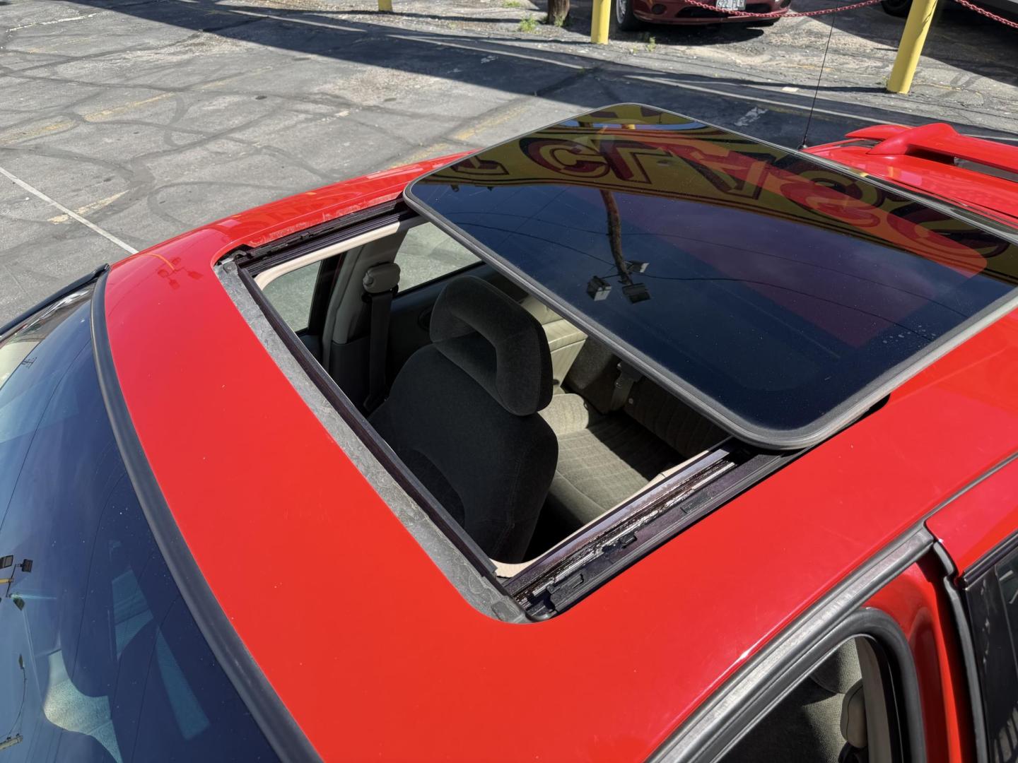 2002 Rallye Red /Black Pontiac Grand AM GT1 sedan (1G2NV52E02C) with an 3.4L V6 OHV 12V engine, 4-Speed Automatic Overdrive transmission, located at 801 South State Street, Salt Lake City, UT, 84111, (801) 328-0098, 40.751953, -111.888206 - Certified Carfax 1-Owner car!!! Clean title! No accidents on Carfax! Immaculate condition inside and out for the year. Hard to find this clean in this condition, vehicle has been meticulously maintained and cared for. Certified for up to a 5 year bumper warranty that can be added onto the vehicle, a - Photo#26