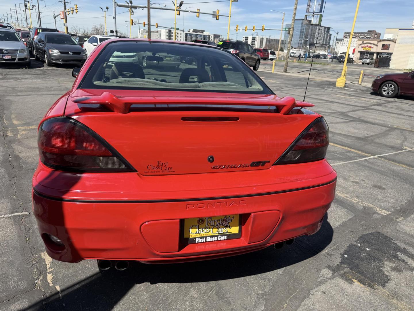 2002 Rallye Red /Black Pontiac Grand AM GT1 sedan (1G2NV52E02C) with an 3.4L V6 OHV 12V engine, 4-Speed Automatic Overdrive transmission, located at 801 South State Street, Salt Lake City, UT, 84111, (801) 328-0098, 40.751953, -111.888206 - Certified Carfax 1-Owner car!!! Clean title! No accidents on Carfax! Immaculate condition inside and out for the year. Hard to find this clean in this condition, vehicle has been meticulously maintained and cared for. Certified for up to a 5 year bumper warranty that can be added onto the vehicle, a - Photo#31