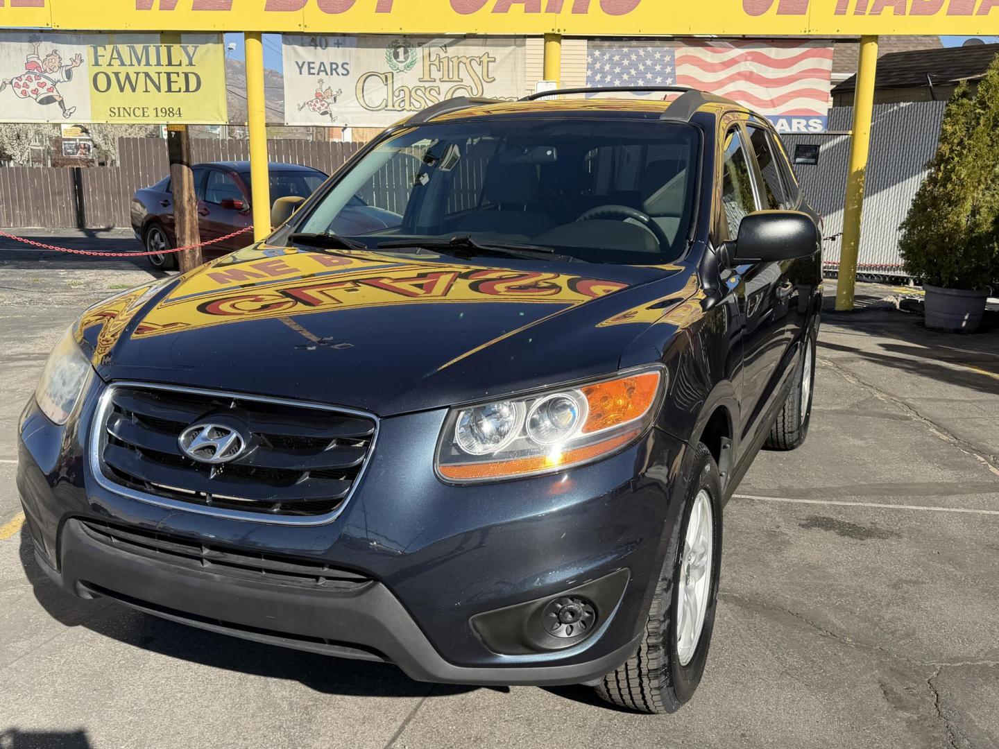2011 Black /Gray Hyundai Santa Fe GL 2.4 4WD (5XYZGDAB3BG) with an 2.4L L4 DOHC 16V engine, 6-Speed Automatic transmission, located at 801 South State Street, Salt Lake City, UT, 84111, (801) 328-0098, 40.751953, -111.888206 - We put all 4 Brand new Tires! Clean title!!! Approved for up to a 5 year bumper warranty through Protective that can be added onto the vehicle. Great fuel economy this is a fuel efficient SUV at an affordable price hard to find. Features: 4WD/AWD, ABS Brakes, Air Conditioning, Alloy Wheels, AM/FM S - Photo#2