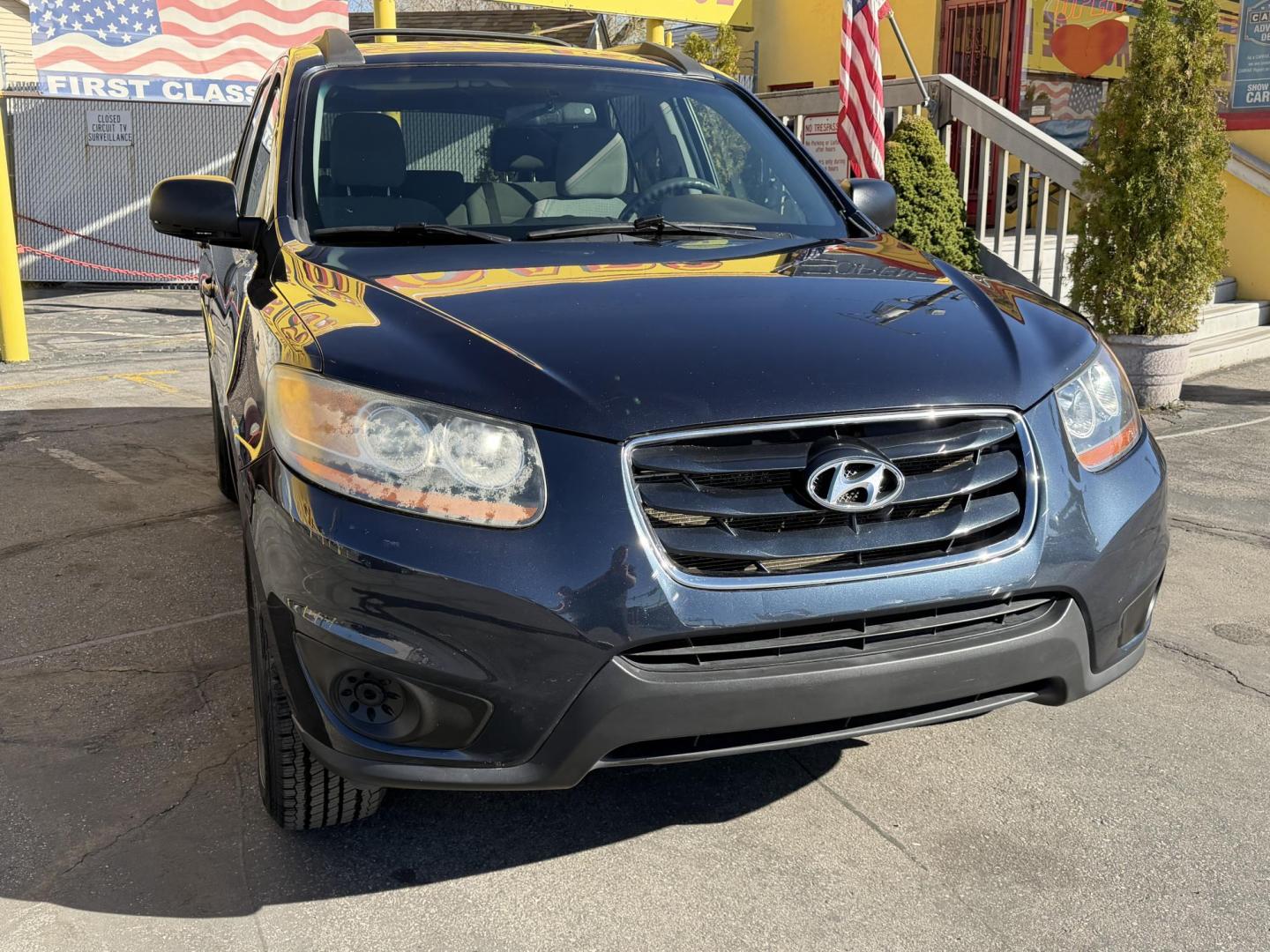 2011 Black /Gray Hyundai Santa Fe GL 2.4 4WD (5XYZGDAB3BG) with an 2.4L L4 DOHC 16V engine, 6-Speed Automatic transmission, located at 801 South State Street, Salt Lake City, UT, 84111, (801) 328-0098, 40.751953, -111.888206 - We put all 4 Brand new Tires! Clean title!!! Approved for up to a 5 year bumper warranty through Protective that can be added onto the vehicle. Great fuel economy this is a fuel efficient SUV at an affordable price hard to find. Features: 4WD/AWD, ABS Brakes, Air Conditioning, Alloy Wheels, AM/FM S - Photo#4