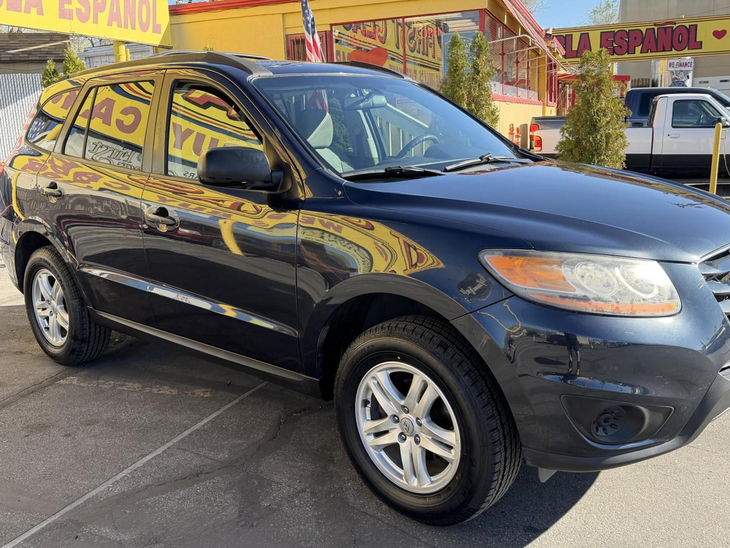 2011 Black /Gray Hyundai Santa Fe GL 2.4 4WD (5XYZGDAB3BG) with an 2.4L L4 DOHC 16V engine, 6-Speed Automatic transmission, located at 801 South State Street, Salt Lake City, UT, 84111, (801) 328-0098, 40.751953, -111.888206 - We put all 4 Brand new Tires! Clean title!!! Approved for up to a 5 year bumper warranty through Protective that can be added onto the vehicle. Great fuel economy this is a fuel efficient SUV at an affordable price hard to find. Features: 4WD/AWD, ABS Brakes, Air Conditioning, Alloy Wheels, AM/FM S - Photo#6