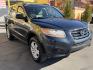 2011 Black /Gray Hyundai Santa Fe GL 2.4 4WD (5XYZGDAB3BG) with an 2.4L L4 DOHC 16V engine, 6-Speed Automatic transmission, located at 801 South State Street, Salt Lake City, UT, 84111, (801) 328-0098, 40.751953, -111.888206 - We put all 4 Brand new Tires! Clean title!!! Approved for up to a 5 year bumper warranty through Protective that can be added onto the vehicle. Great fuel economy this is a fuel efficient SUV at an affordable price hard to find. Features: 4WD/AWD, ABS Brakes, Air Conditioning, Alloy Wheels, AM/FM S - Photo#5