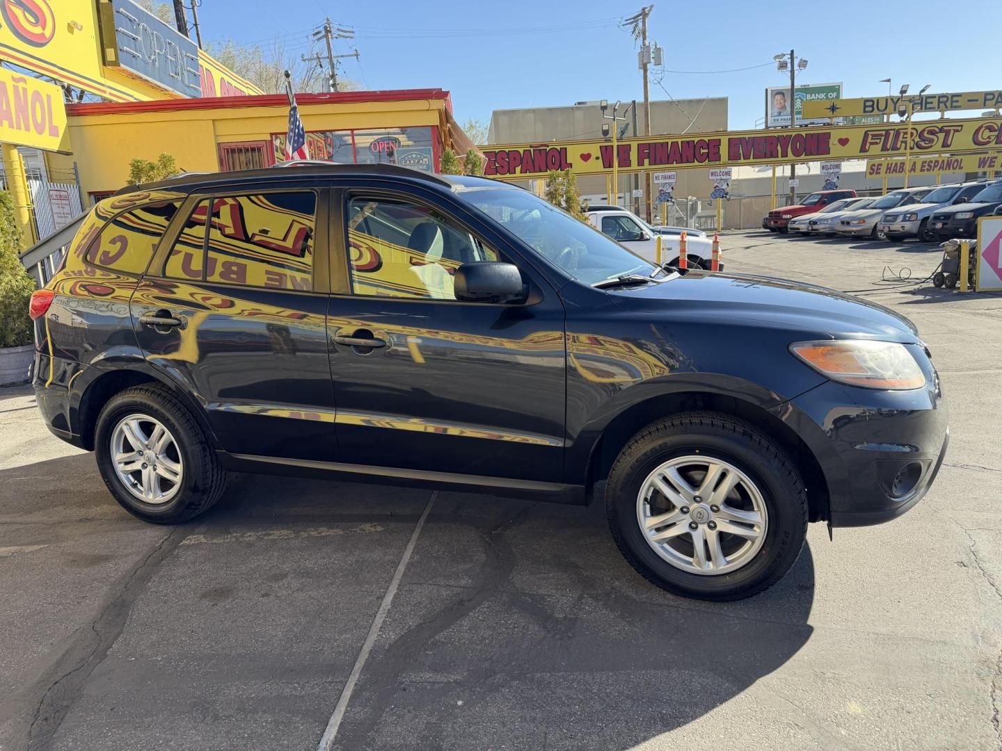 2011 Black /Gray Hyundai Santa Fe GL 2.4 4WD (5XYZGDAB3BG) with an 2.4L L4 DOHC 16V engine, 6-Speed Automatic transmission, located at 801 South State Street, Salt Lake City, UT, 84111, (801) 328-0098, 40.751953, -111.888206 - We put all 4 Brand new Tires! Clean title!!! Approved for up to a 5 year bumper warranty through Protective that can be added onto the vehicle. Great fuel economy this is a fuel efficient SUV at an affordable price hard to find. Features: 4WD/AWD, ABS Brakes, Air Conditioning, Alloy Wheels, AM/FM S - Photo#7